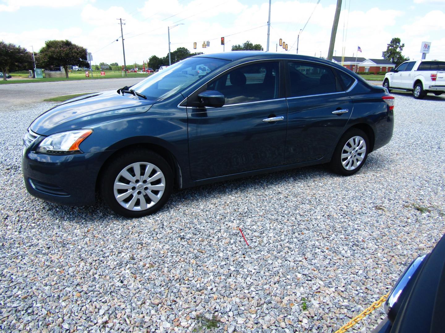 2015 Blue /Black Nissan Sentra S 6MT (3N1AB7AP0FY) with an 1.8L L4 SFI DOHC 16V engine, Automatic transmission, located at 15016 S Hwy 231, Midland City, AL, 36350, (334) 983-3001, 31.306210, -85.495277 - Photo#2