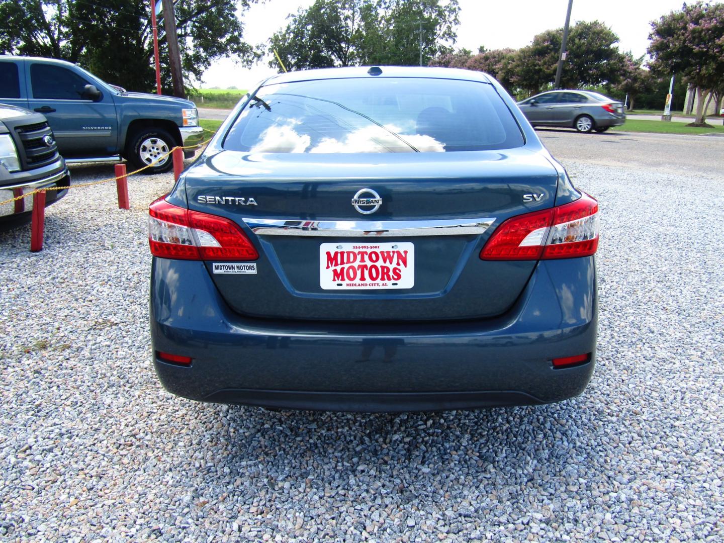 2015 Blue /Black Nissan Sentra S 6MT (3N1AB7AP0FY) with an 1.8L L4 SFI DOHC 16V engine, Automatic transmission, located at 15016 S Hwy 231, Midland City, AL, 36350, (334) 983-3001, 31.306210, -85.495277 - Photo#6