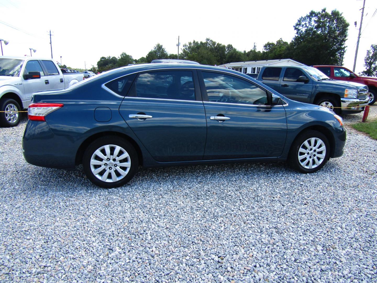 2015 Blue /Black Nissan Sentra S 6MT (3N1AB7AP0FY) with an 1.8L L4 SFI DOHC 16V engine, Automatic transmission, located at 15016 S Hwy 231, Midland City, AL, 36350, (334) 983-3001, 31.306210, -85.495277 - Photo#7