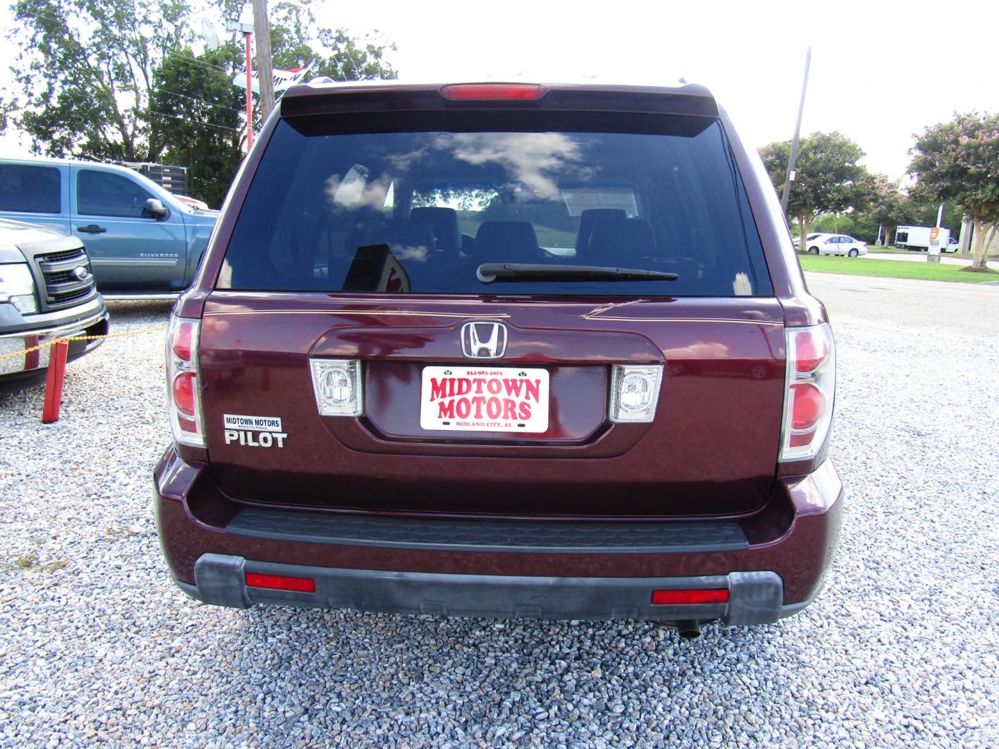 2007 Maroon /Gray Honda Pilot EX-L 2WD w/ DVD (5FNYF28667B) with an 3.5L V6 SOHC 24V engine, Automatic transmission, located at 15016 S Hwy 231, Midland City, AL, 36350, (334) 983-3001, 31.306210, -85.495277 - Photo#6