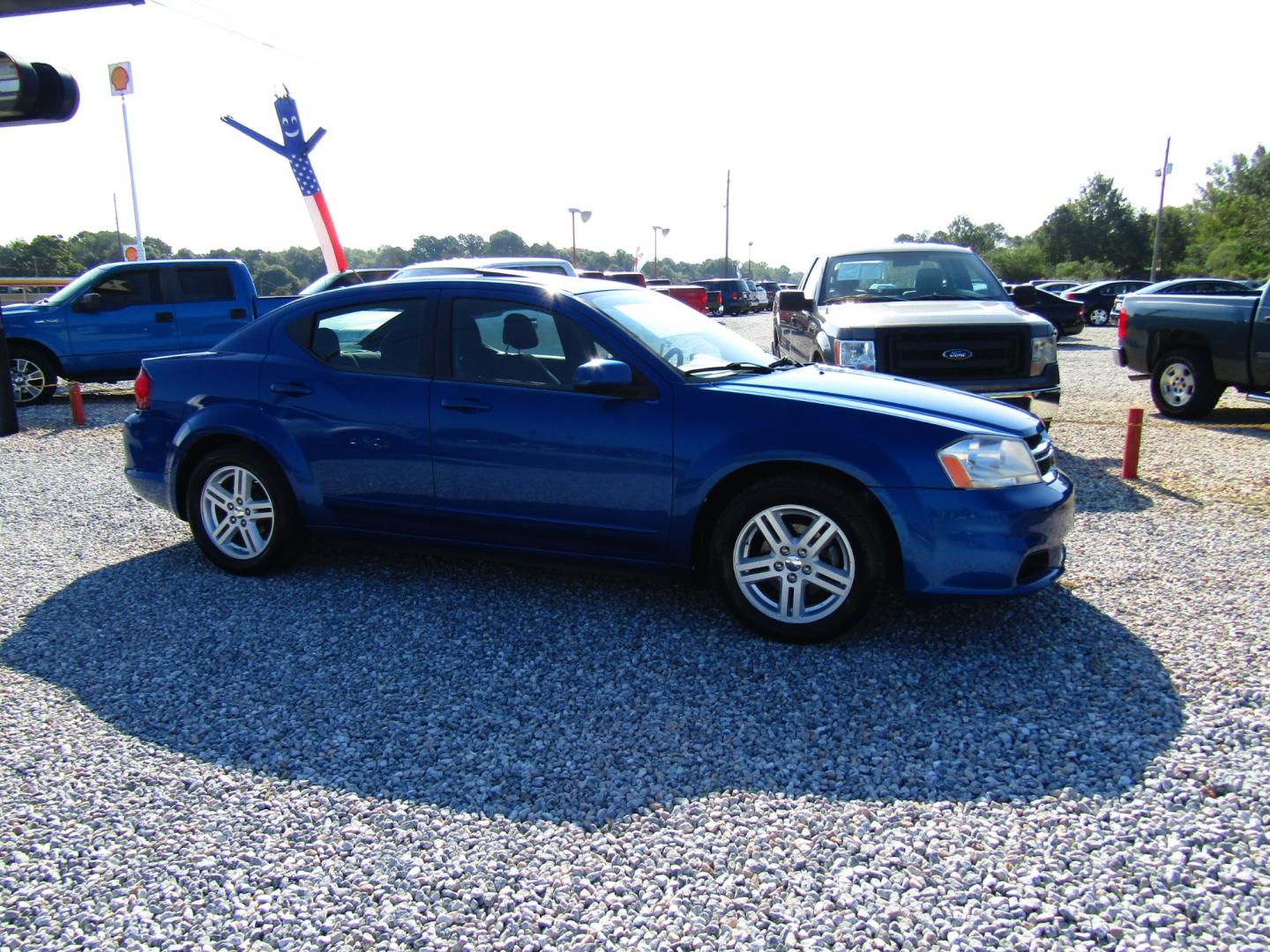 2013 Blue Dodge Avenger SXT (1C3CDZCG6DN) with an 3.6L V6 DOHC 24V FFV engine, Automatic transmission, located at 15016 S Hwy 231, Midland City, AL, 36350, (334) 983-3001, 31.306210, -85.495277 - Photo#0