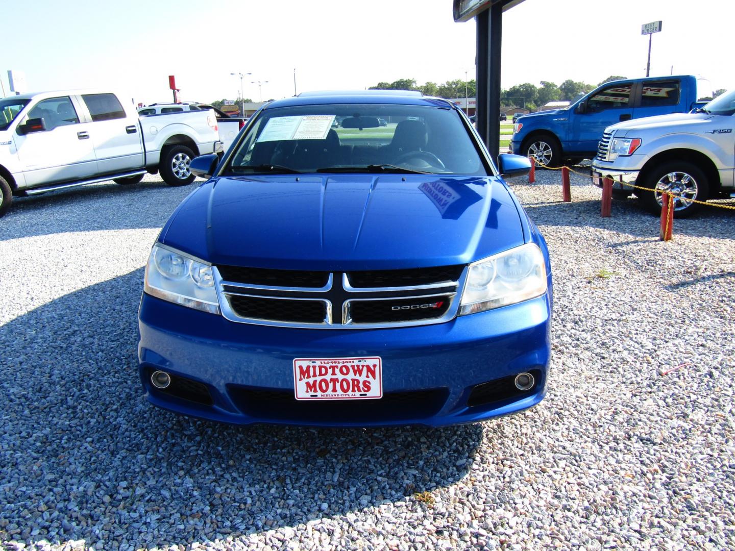 2013 Blue Dodge Avenger SXT (1C3CDZCG6DN) with an 3.6L V6 DOHC 24V FFV engine, Automatic transmission, located at 15016 S Hwy 231, Midland City, AL, 36350, (334) 983-3001, 31.306210, -85.495277 - Photo#1