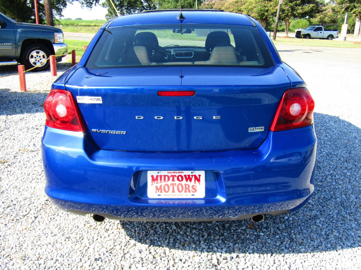 2013 Blue Dodge Avenger SXT (1C3CDZCG6DN) with an 3.6L V6 DOHC 24V FFV engine, Automatic transmission, located at 15016 S Hwy 231, Midland City, AL, 36350, (334) 983-3001, 31.306210, -85.495277 - Photo#6