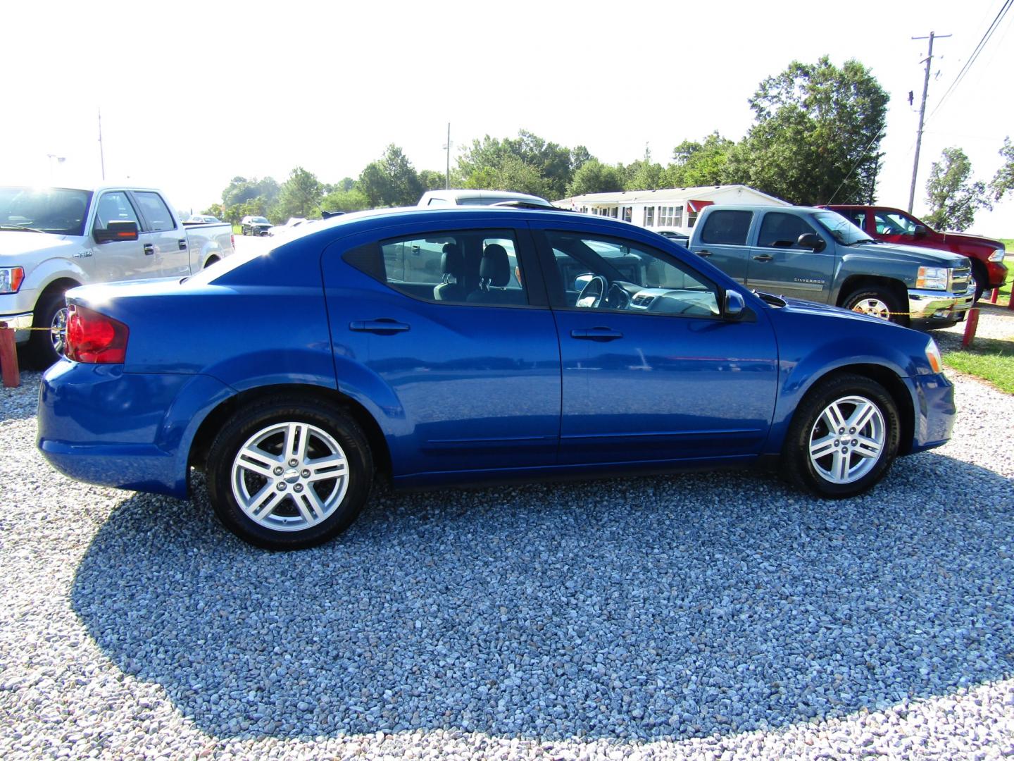 2013 Blue Dodge Avenger SXT (1C3CDZCG6DN) with an 3.6L V6 DOHC 24V FFV engine, Automatic transmission, located at 15016 S Hwy 231, Midland City, AL, 36350, (334) 983-3001, 31.306210, -85.495277 - Photo#7