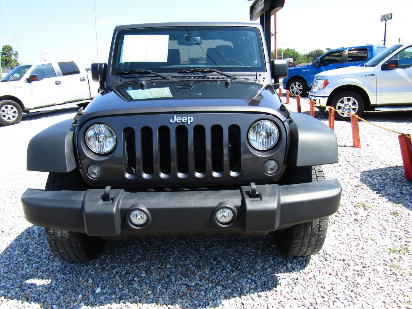 2014 Gray Jeep Wrangler Sport 4WD (1C4AJWAG7EL) with an 3.6L V6 DOHC 24V FFV engine, Automatic transmission, located at 15016 S Hwy 231, Midland City, AL, 36350, (334) 983-3001, 31.306210, -85.495277 - Photo#1