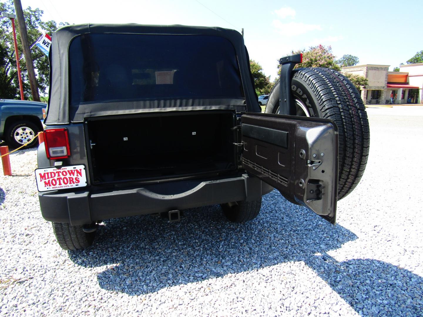 2014 Gray Jeep Wrangler Sport 4WD (1C4AJWAG7EL) with an 3.6L V6 DOHC 24V FFV engine, Automatic transmission, located at 15016 S Hwy 231, Midland City, AL, 36350, (334) 983-3001, 31.306210, -85.495277 - Photo#6