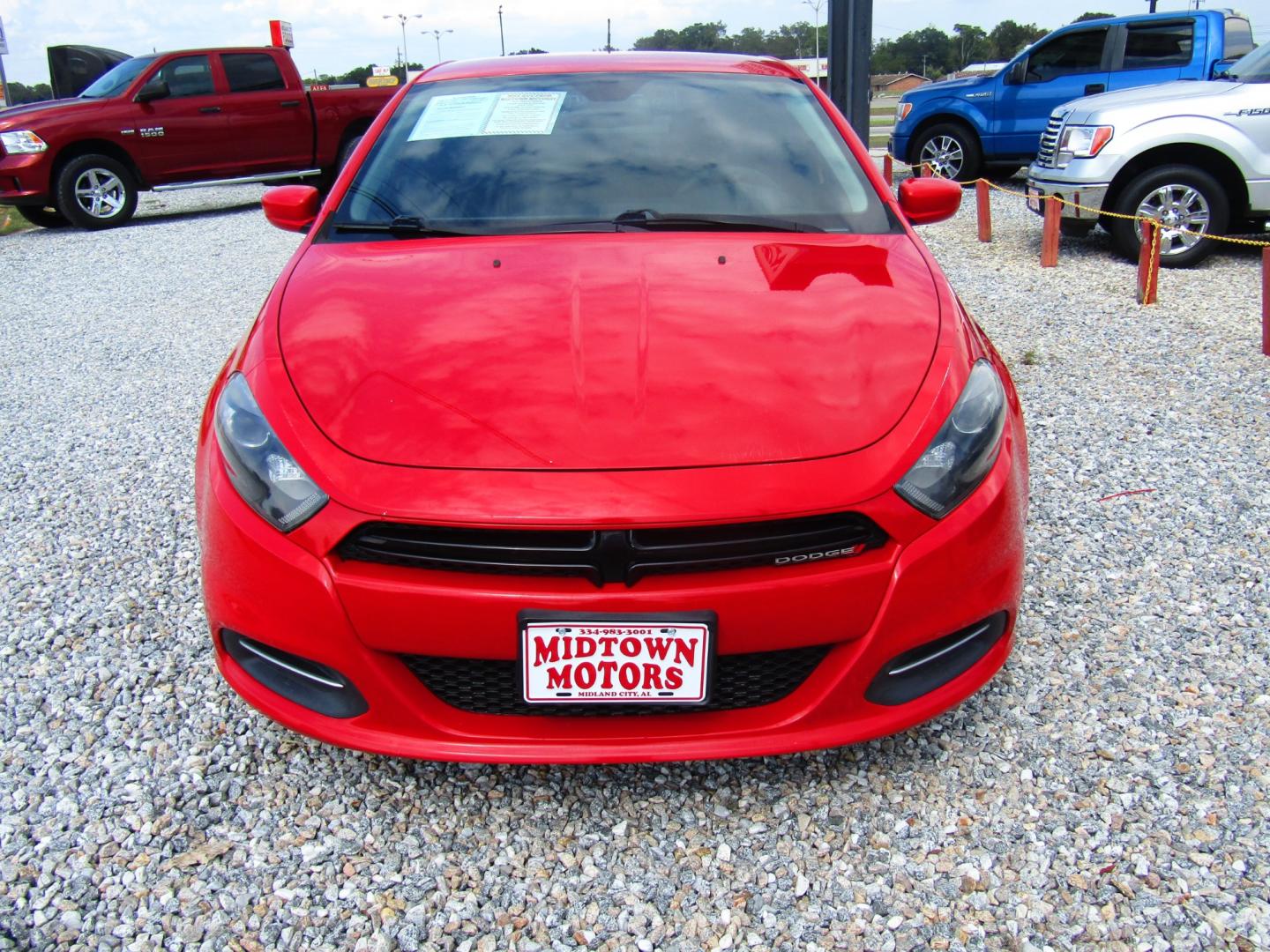 2016 Red /Black Dodge Dart SXT (1C3CDFBB2GD) with an 2.4L L4 DOHC 16V engine, Automatic transmission, located at 15016 S Hwy 231, Midland City, AL, 36350, (334) 983-3001, 31.306210, -85.495277 - Photo#1