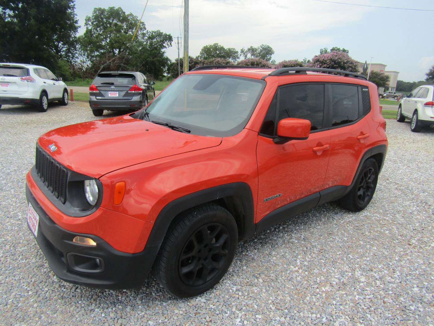 2015 Orange Jeep Renegade Latitude FWD (ZACCJABT8FP) with an 2.4L L4 engine, Automatic transmission, located at 15016 S Hwy 231, Midland City, AL, 36350, (334) 983-3001, 31.306210, -85.495277 - Photo#2