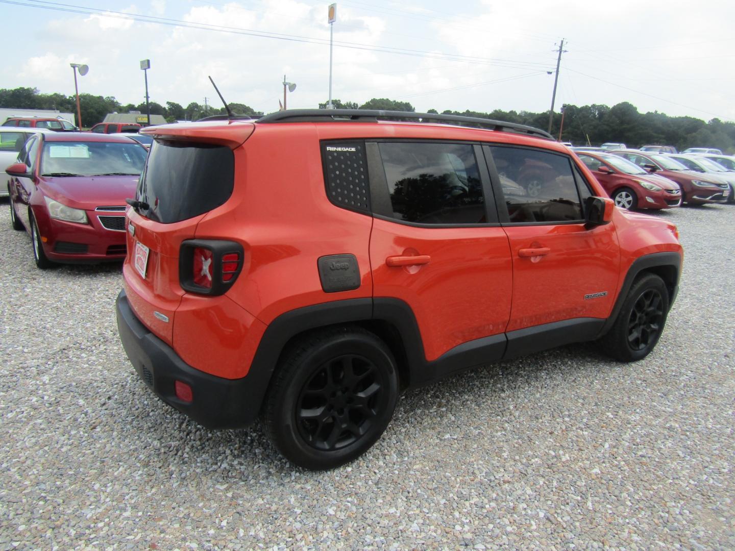 2015 Orange Jeep Renegade Latitude FWD (ZACCJABT8FP) with an 2.4L L4 engine, Automatic transmission, located at 15016 S Hwy 231, Midland City, AL, 36350, (334) 983-3001, 31.306210, -85.495277 - Photo#7