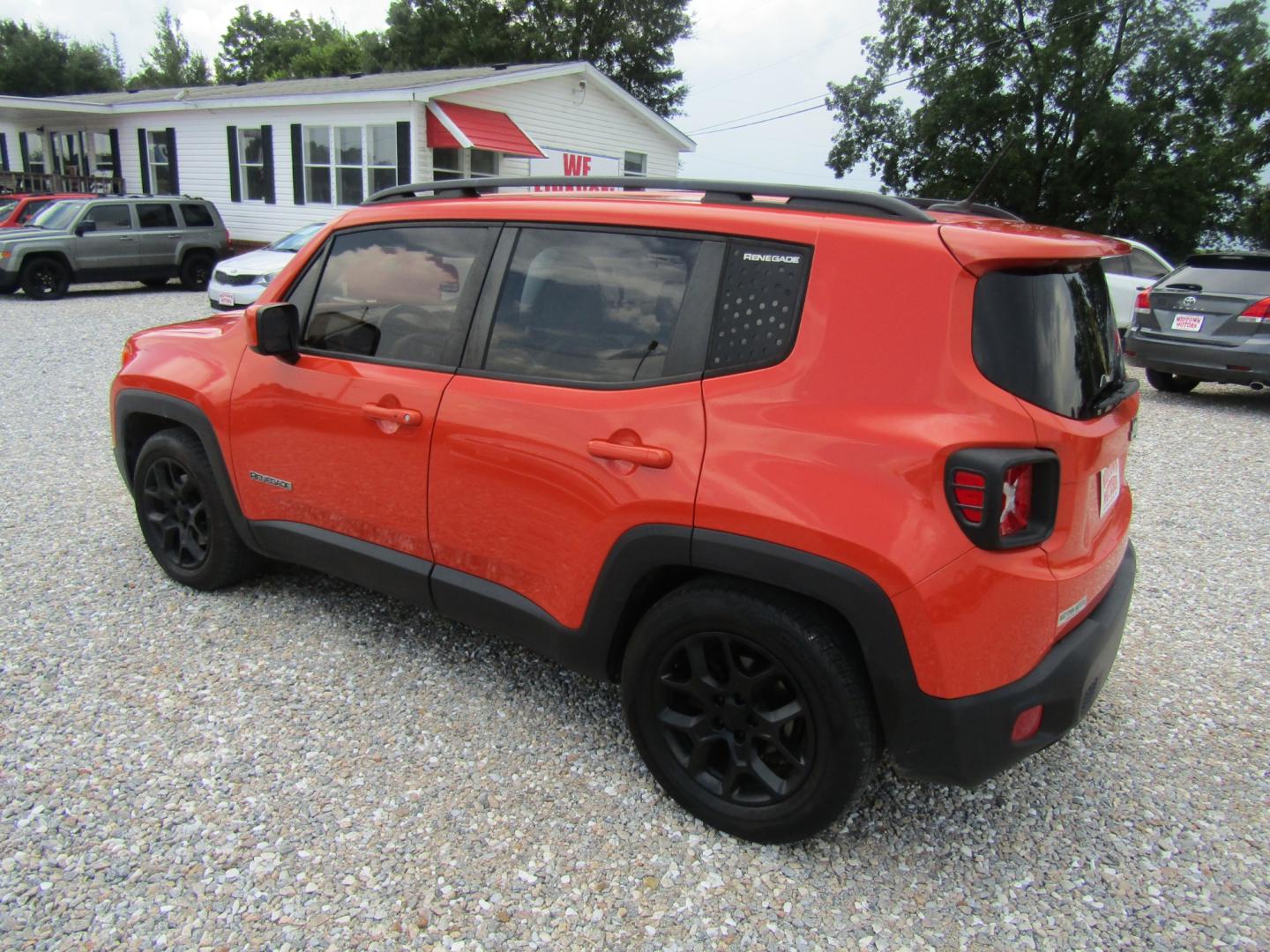 2015 Orange Jeep Renegade Latitude FWD (ZACCJABT8FP) with an 2.4L L4 engine, Automatic transmission, located at 15016 S Hwy 231, Midland City, AL, 36350, (334) 983-3001, 31.306210, -85.495277 - Photo#5