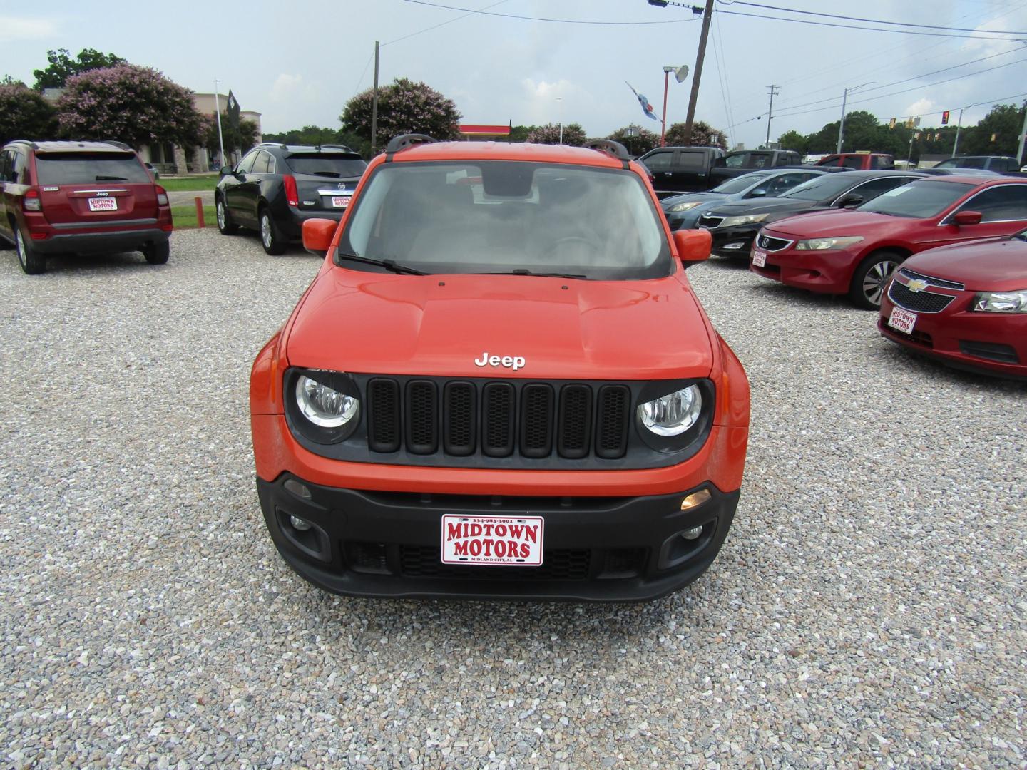 2015 Orange Jeep Renegade Latitude FWD (ZACCJABT8FP) with an 2.4L L4 engine, Automatic transmission, located at 15016 S Hwy 231, Midland City, AL, 36350, (334) 983-3001, 31.306210, -85.495277 - Photo#1