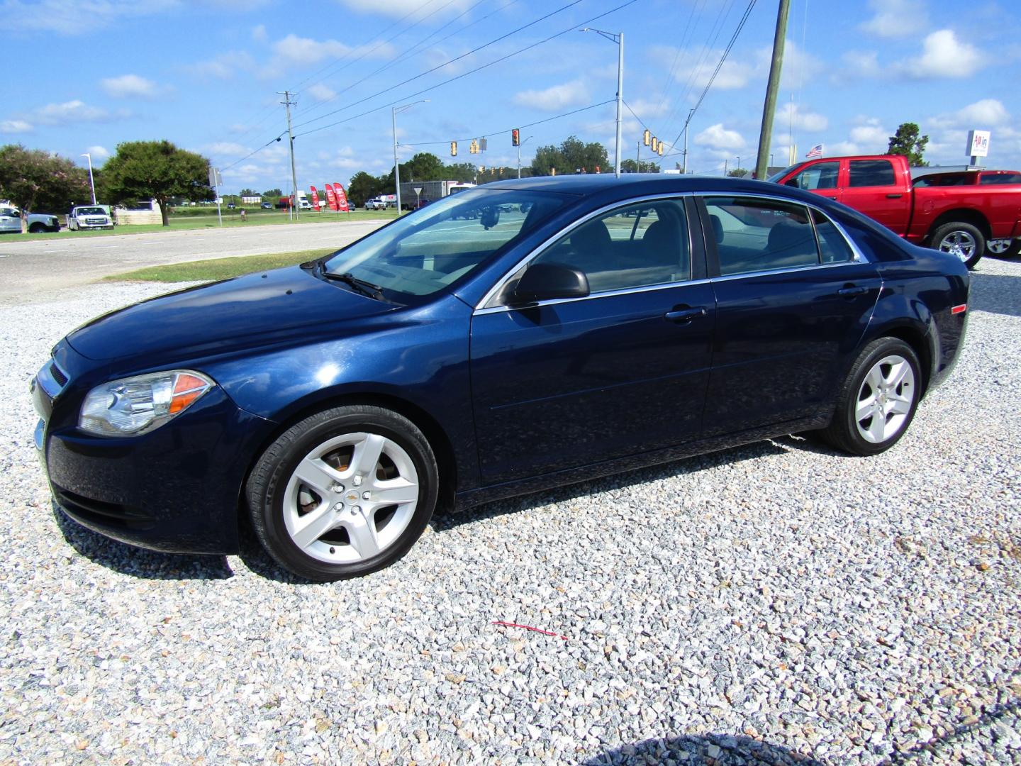 2011 Blue Chevrolet Malibu LS (1G1ZB5E15BF) with an 2.4L L4 DOHC 16V engine, Automatic transmission, located at 15016 S Hwy 231, Midland City, AL, 36350, (334) 983-3001, 31.306210, -85.495277 - Photo#2