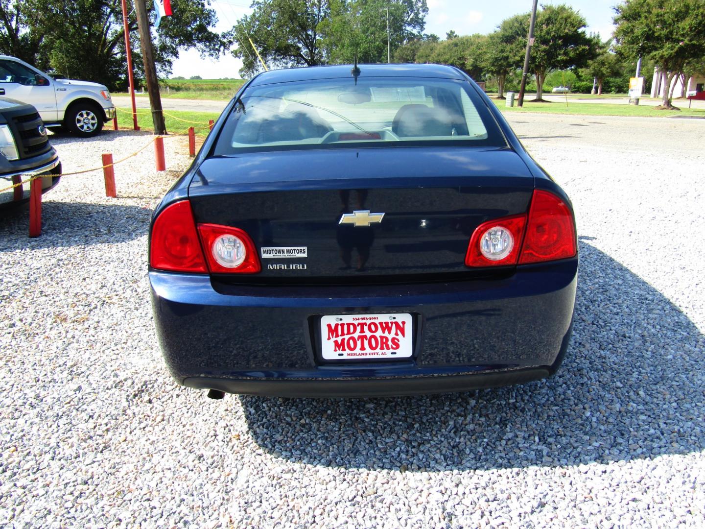 2011 Blue Chevrolet Malibu LS (1G1ZB5E15BF) with an 2.4L L4 DOHC 16V engine, Automatic transmission, located at 15016 S Hwy 231, Midland City, AL, 36350, (334) 983-3001, 31.306210, -85.495277 - Photo#6