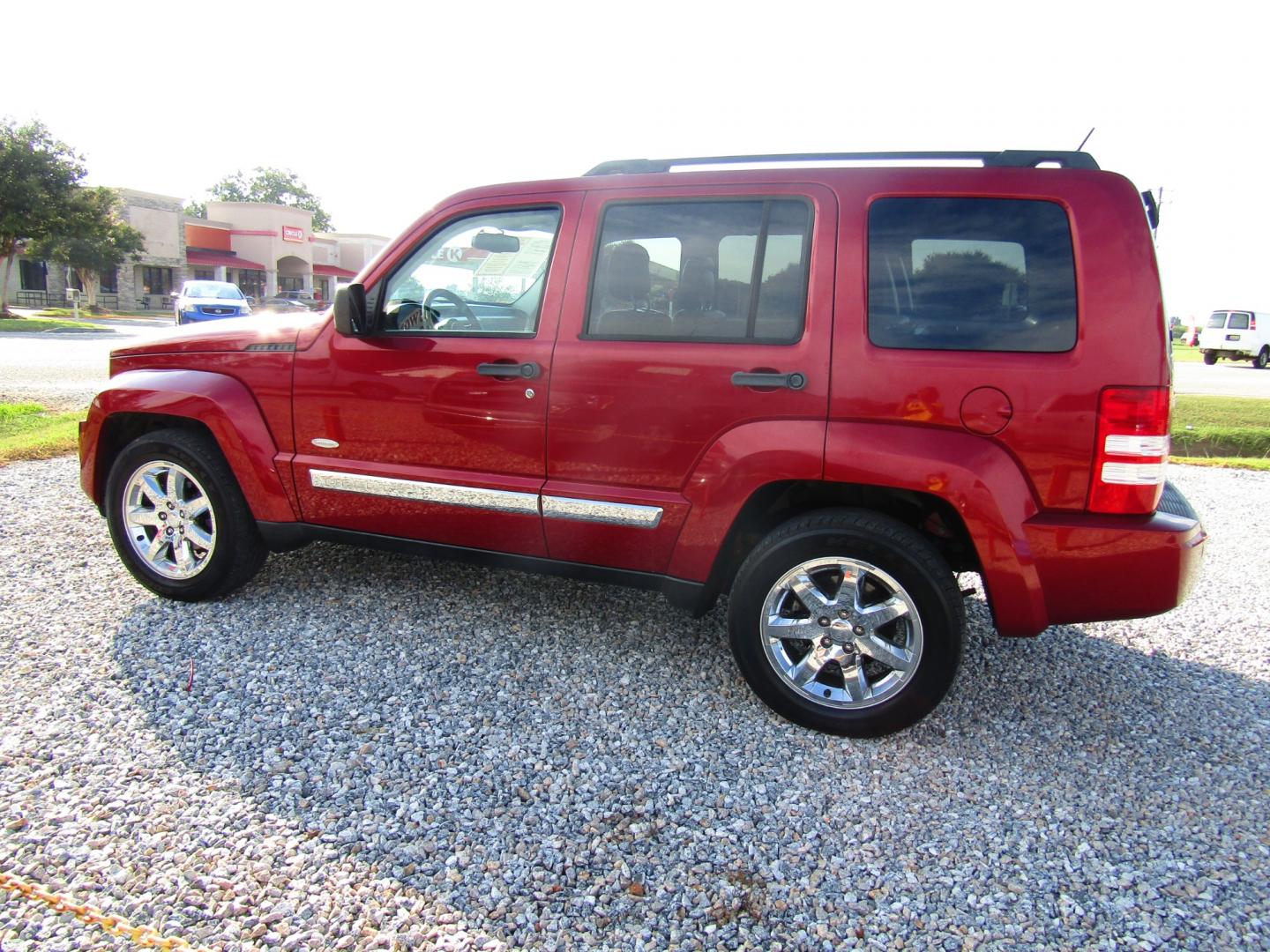 2012 Red /Black Jeep Liberty Sport 2WD (1C4PJLAK6CW) with an 3.7L V6 SOHC 12V engine, Automatic transmission, located at 15016 S Hwy 231, Midland City, AL, 36350, (334) 983-3001, 31.306210, -85.495277 - Photo#5