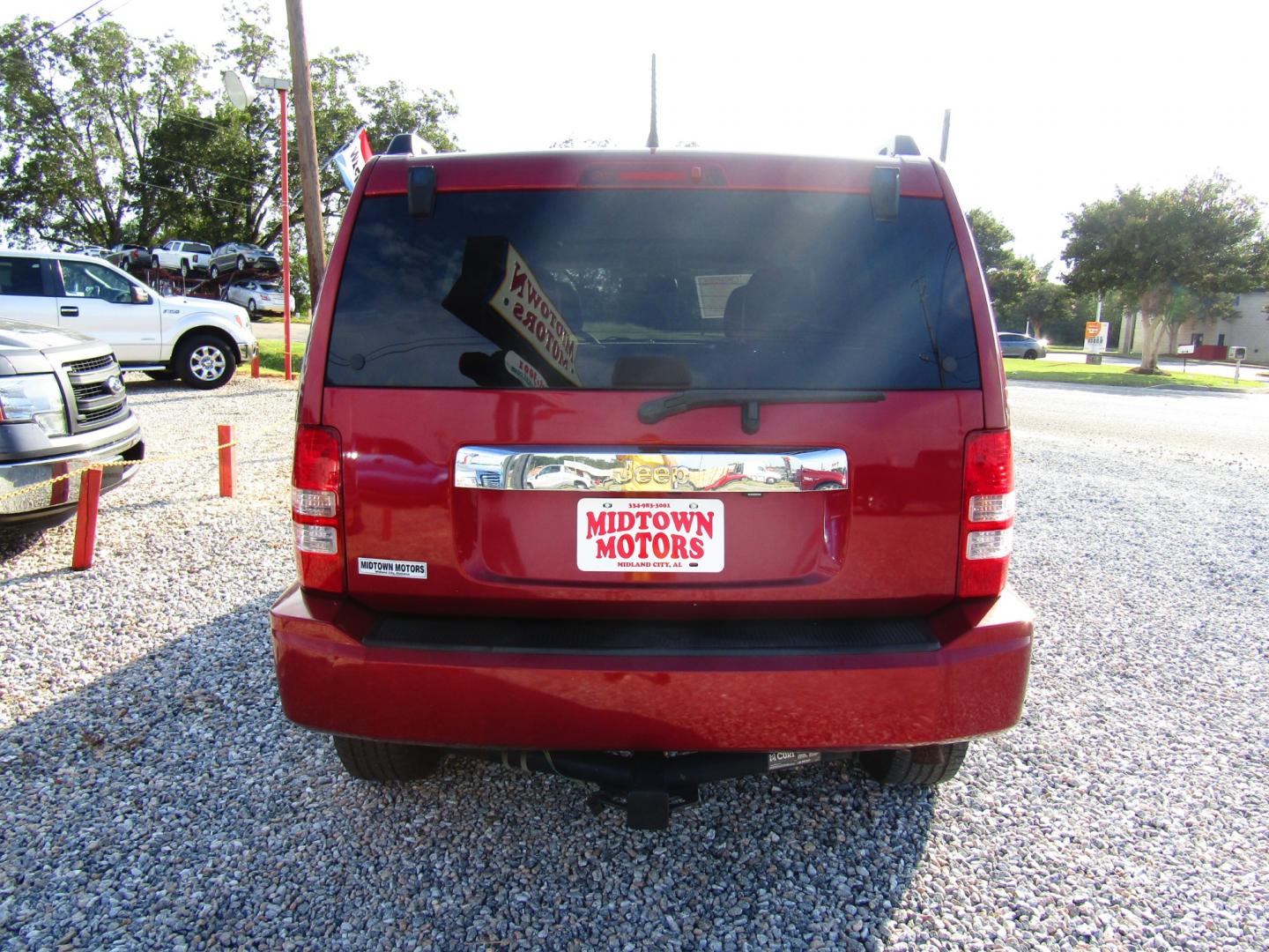 2012 Red /Black Jeep Liberty Sport 2WD (1C4PJLAK6CW) with an 3.7L V6 SOHC 12V engine, Automatic transmission, located at 15016 S Hwy 231, Midland City, AL, 36350, (334) 983-3001, 31.306210, -85.495277 - Photo#6