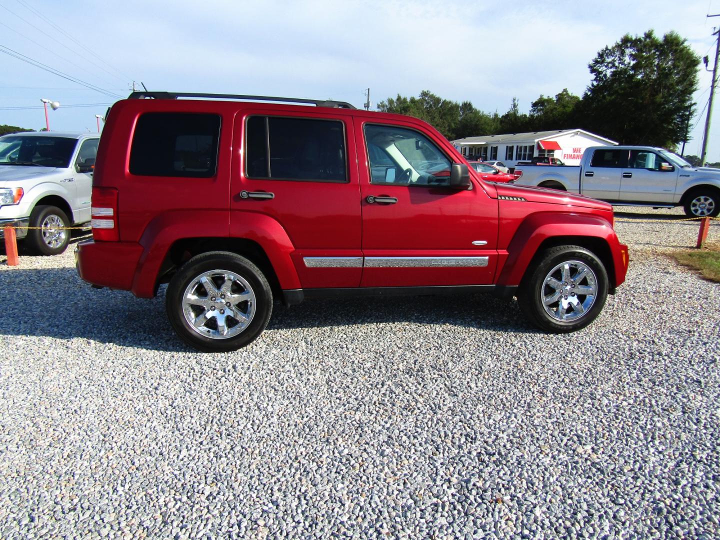 2012 Red /Black Jeep Liberty Sport 2WD (1C4PJLAK6CW) with an 3.7L V6 SOHC 12V engine, Automatic transmission, located at 15016 S Hwy 231, Midland City, AL, 36350, (334) 983-3001, 31.306210, -85.495277 - Photo#8