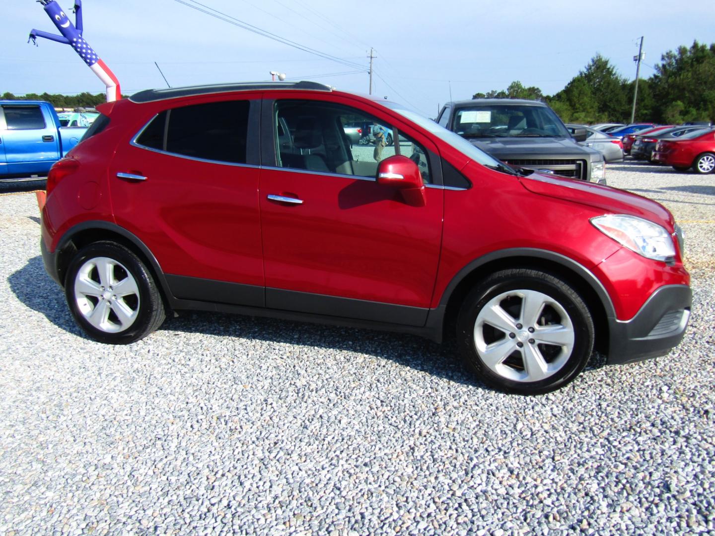 2015 Red Buick Encore Base FWD (KL4CJASB9FB) with an 1.4L L4 DOHC 16V TURBO engine, Automatic transmission, located at 15016 S Hwy 231, Midland City, AL, 36350, (334) 983-3001, 31.306210, -85.495277 - Photo#0