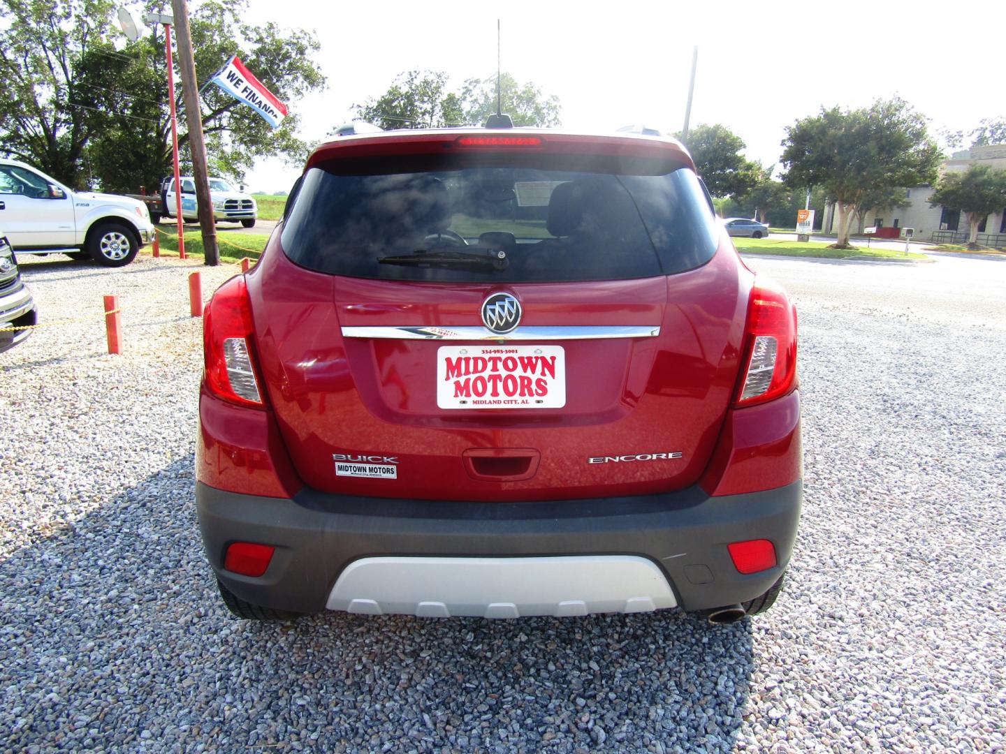 2015 Red Buick Encore Base FWD (KL4CJASB9FB) with an 1.4L L4 DOHC 16V TURBO engine, Automatic transmission, located at 15016 S Hwy 231, Midland City, AL, 36350, (334) 983-3001, 31.306210, -85.495277 - Photo#6