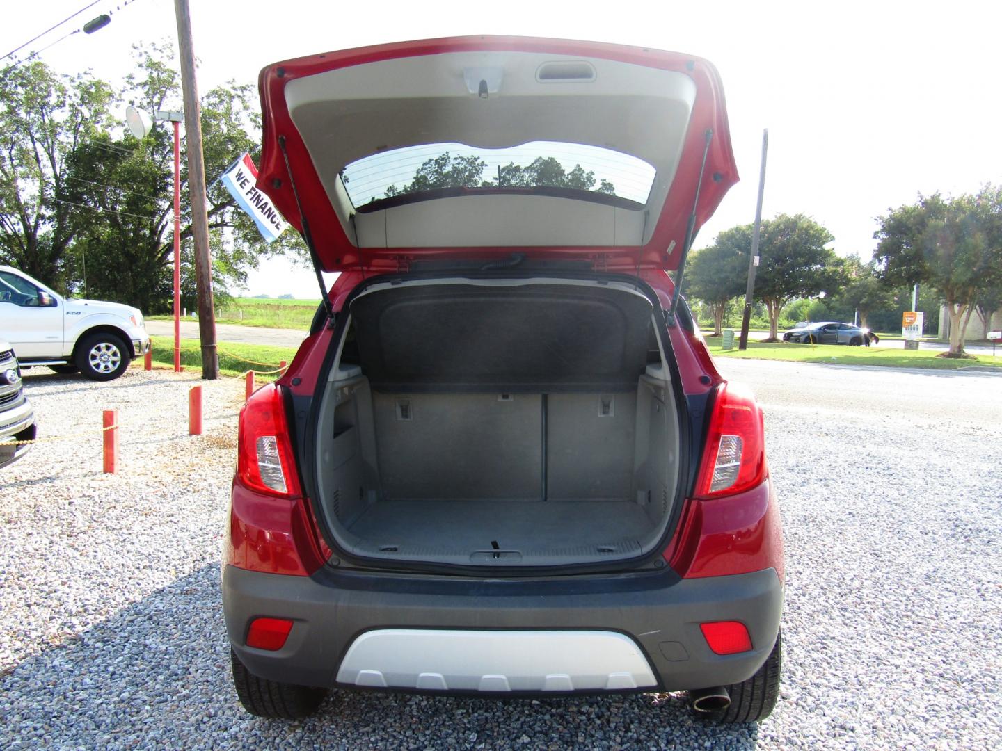 2015 Red Buick Encore Base FWD (KL4CJASB9FB) with an 1.4L L4 DOHC 16V TURBO engine, Automatic transmission, located at 15016 S Hwy 231, Midland City, AL, 36350, (334) 983-3001, 31.306210, -85.495277 - Photo#7