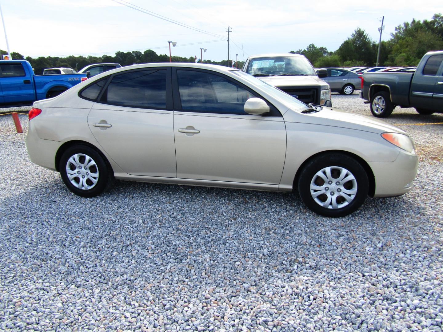 2010 Gold /Tan Hyundai Elantra GLS (KMHDU4AD0AU) with an 2.0L L4 DOHC 16V engine, Automatic transmission, located at 15016 S Hwy 231, Midland City, AL, 36350, (334) 983-3001, 31.306210, -85.495277 - Photo#0