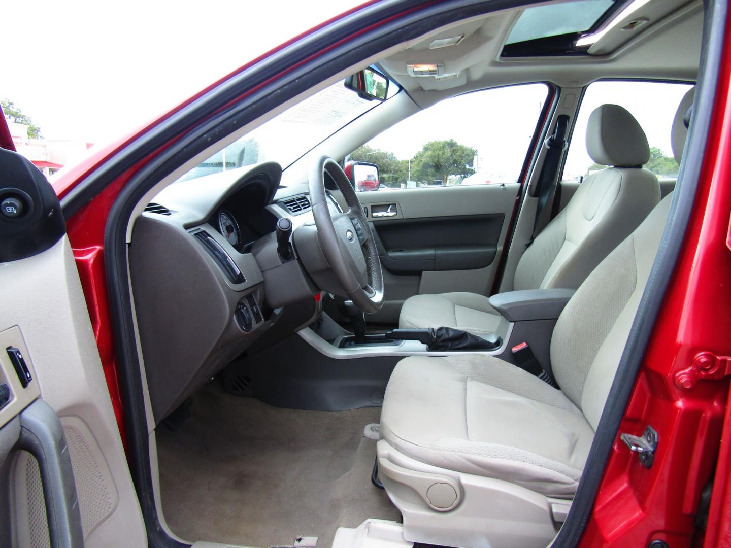 2009 Red /Gray Ford Focus SES Sedan (1FAHP36N59W) with an 2.0L L4 DOHC 16V engine, Automatic transmission, located at 15016 S Hwy 231, Midland City, AL, 36350, (334) 983-3001, 31.306210, -85.495277 - Photo#3