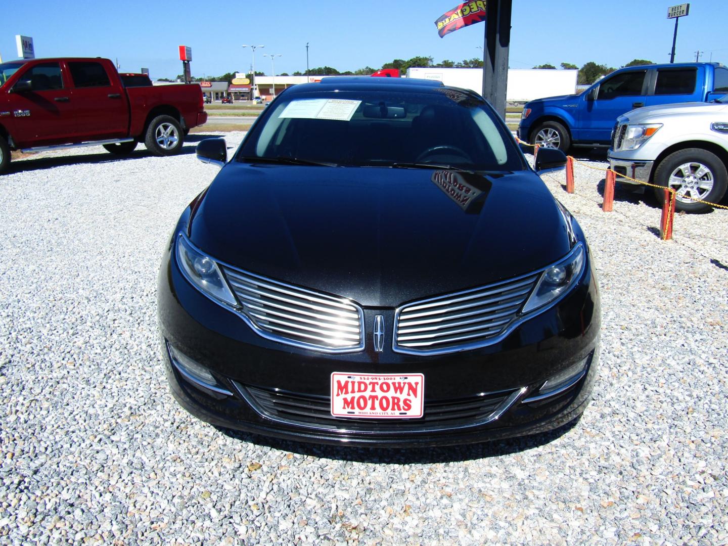 2014 Black /Black Lincoln MKZ FWD (3LN6L2G9XER) with an 2.0L L4 DOHC 16V engine, Automatic transmission, located at 15016 S Hwy 231, Midland City, AL, 36350, (334) 983-3001, 31.306210, -85.495277 - Photo#1