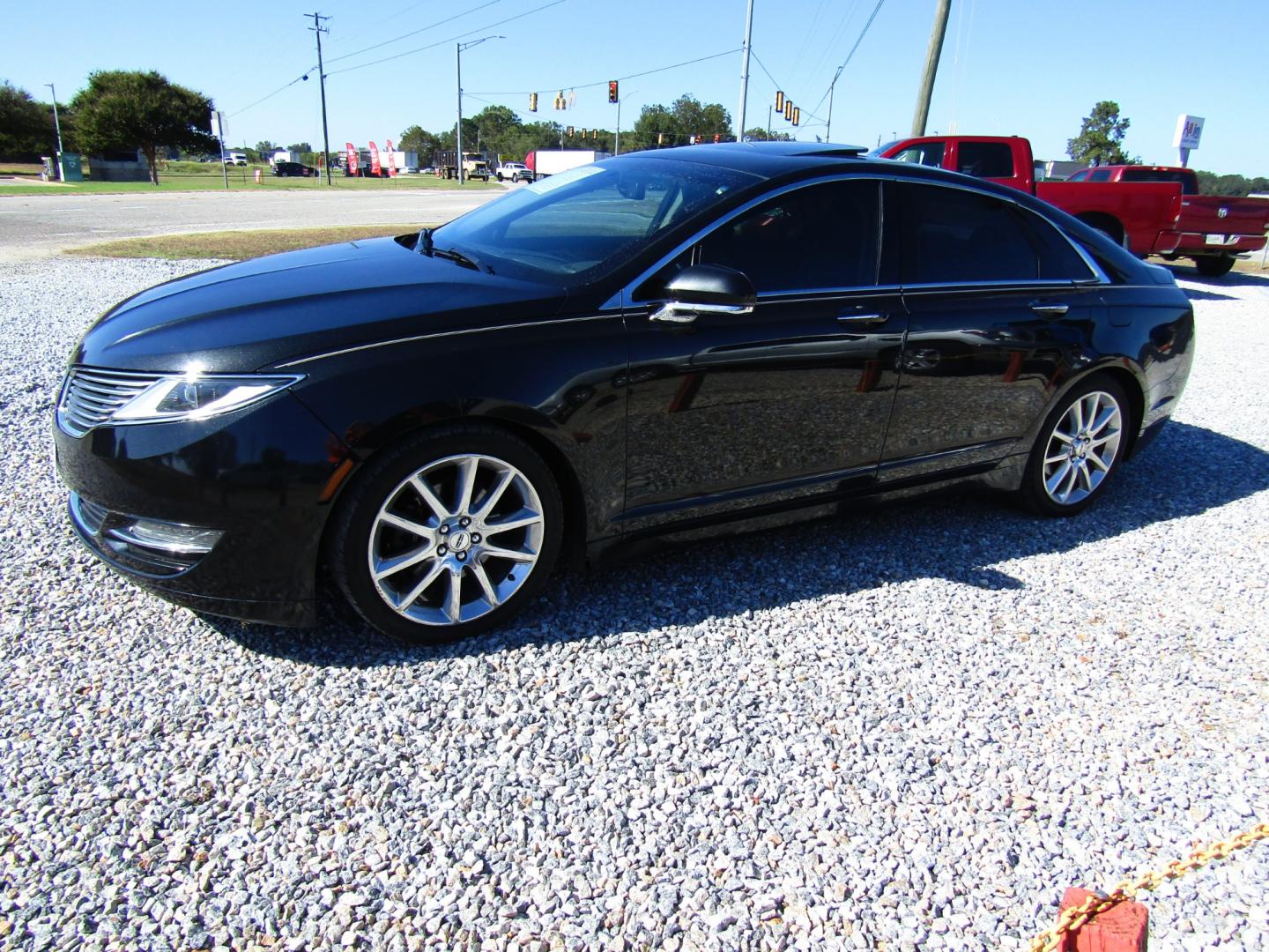 2014 Black /Black Lincoln MKZ FWD (3LN6L2G9XER) with an 2.0L L4 DOHC 16V engine, Automatic transmission, located at 15016 S Hwy 231, Midland City, AL, 36350, (334) 983-3001, 31.306210, -85.495277 - Photo#2