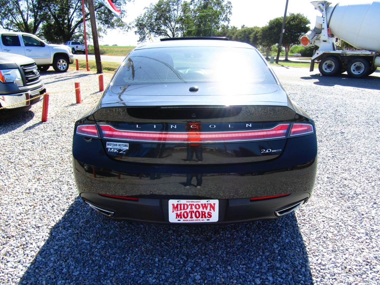 2014 Black /Black Lincoln MKZ FWD (3LN6L2G9XER) with an 2.0L L4 DOHC 16V engine, Automatic transmission, located at 15016 S Hwy 231, Midland City, AL, 36350, (334) 983-3001, 31.306210, -85.495277 - Photo#6