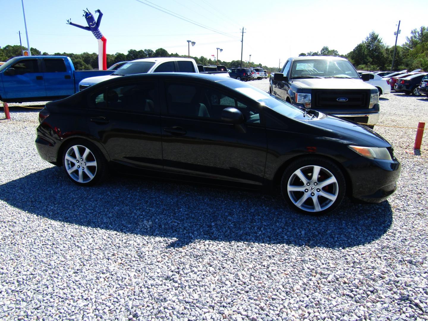 2012 Black /Gray Honda Civic LX Sedan 5-Speed AT (19XFB2F5XCE) with an 1.8L L4 SOHC 16V engine, Automatic transmission, located at 15016 S Hwy 231, Midland City, AL, 36350, (334) 983-3001, 31.306210, -85.495277 - Photo#0