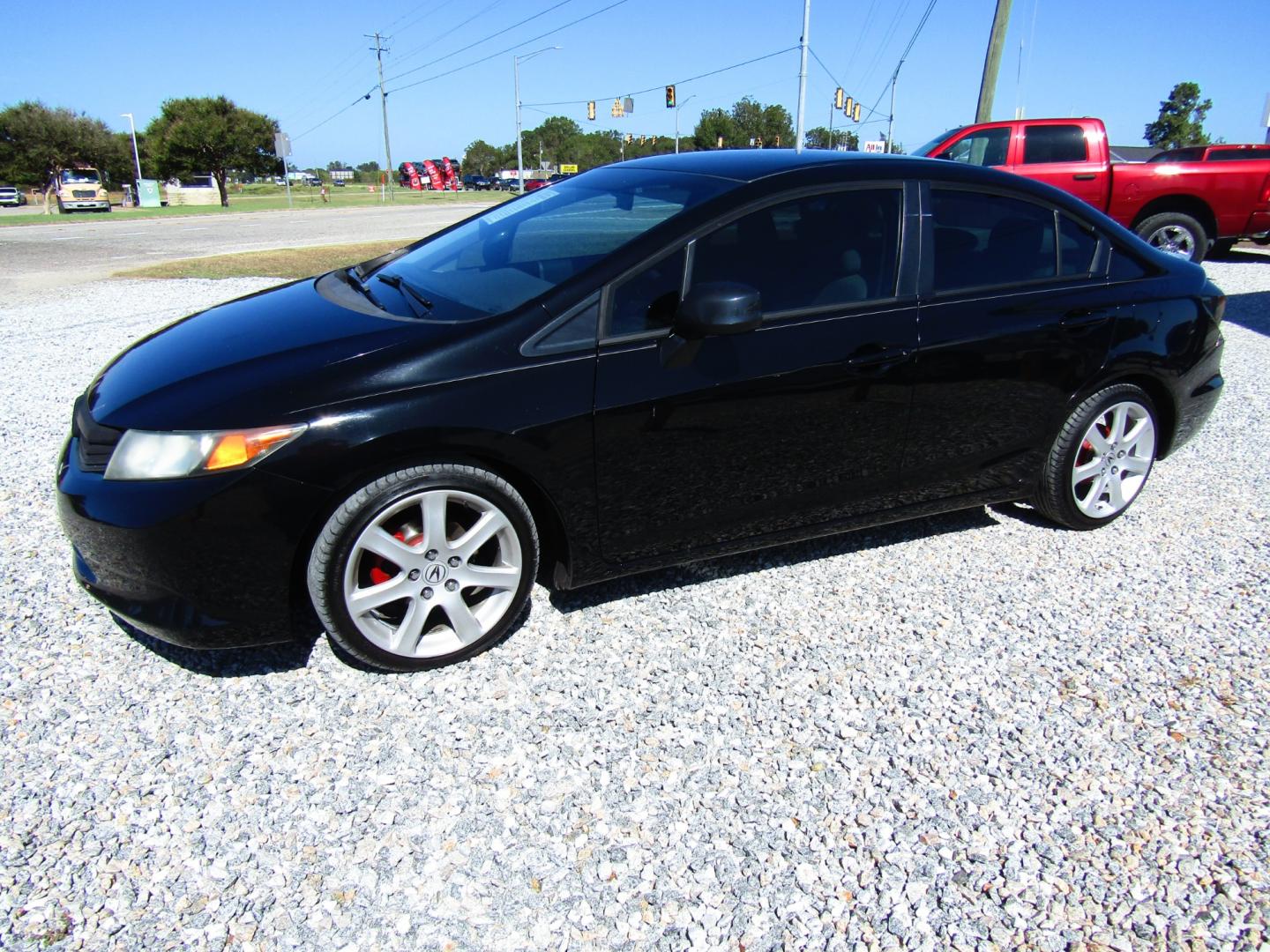 2012 Black /Gray Honda Civic LX Sedan 5-Speed AT (19XFB2F5XCE) with an 1.8L L4 SOHC 16V engine, Automatic transmission, located at 15016 S Hwy 231, Midland City, AL, 36350, (334) 983-3001, 31.306210, -85.495277 - Photo#2