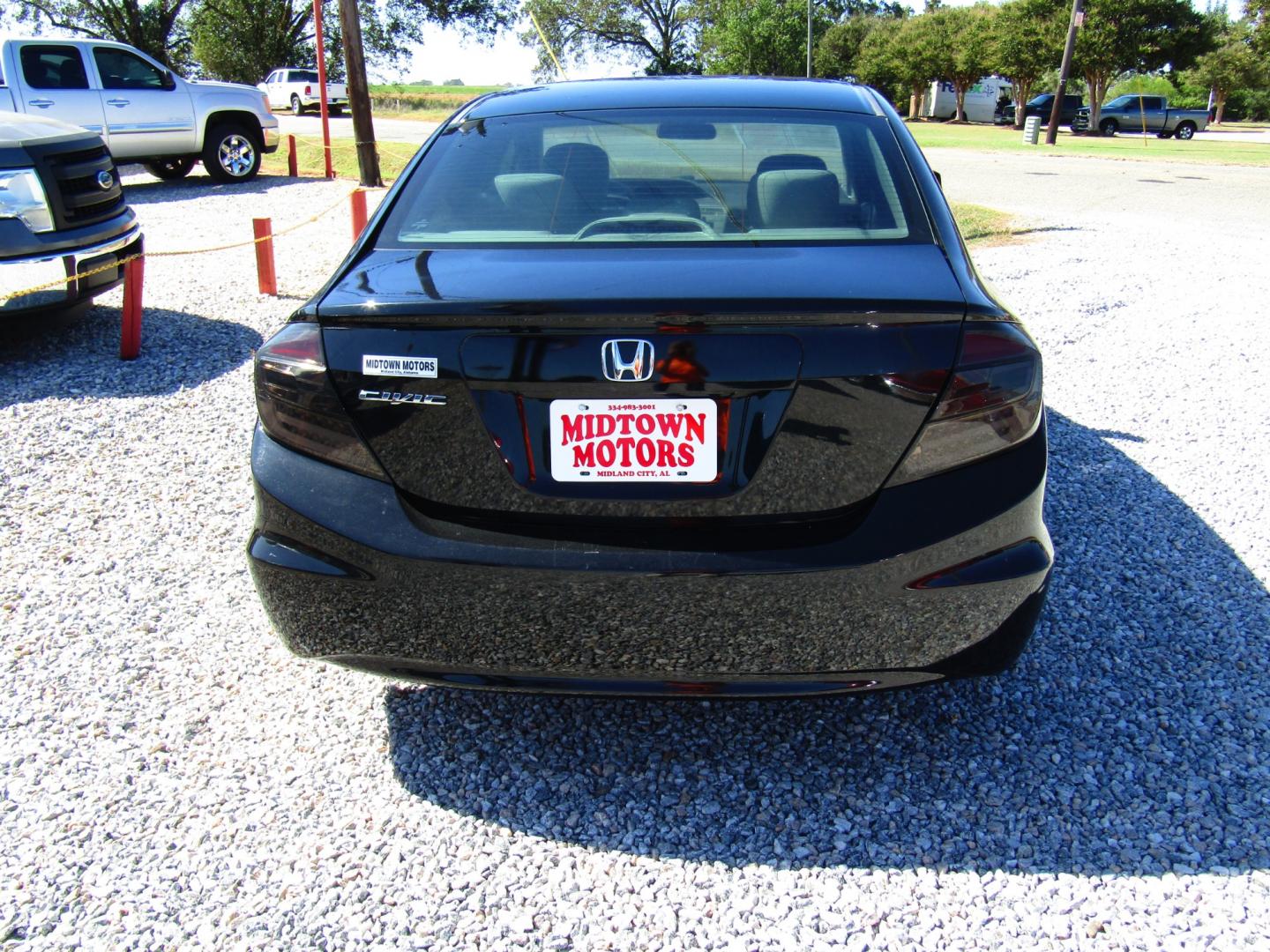 2012 Black /Gray Honda Civic LX Sedan 5-Speed AT (19XFB2F5XCE) with an 1.8L L4 SOHC 16V engine, Automatic transmission, located at 15016 S Hwy 231, Midland City, AL, 36350, (334) 983-3001, 31.306210, -85.495277 - Photo#6