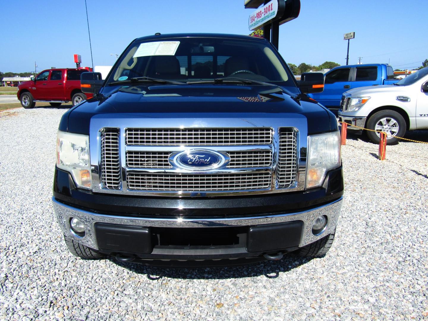 2011 Black /Tan Ford F-150 FX4 SuperCrew 5.5-ft. Bed 4WD (1FTFW1ETXBF) with an 3.5L V6 engine, Automatic transmission, located at 15016 S Hwy 231, Midland City, AL, 36350, (334) 983-3001, 31.306210, -85.495277 - Photo#1