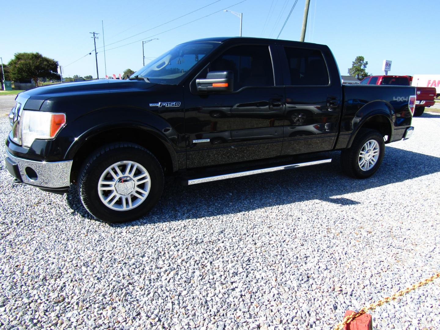 2011 Black /Tan Ford F-150 FX4 SuperCrew 5.5-ft. Bed 4WD (1FTFW1ETXBF) with an 3.5L V6 engine, Automatic transmission, located at 15016 S Hwy 231, Midland City, AL, 36350, (334) 983-3001, 31.306210, -85.495277 - Photo#2