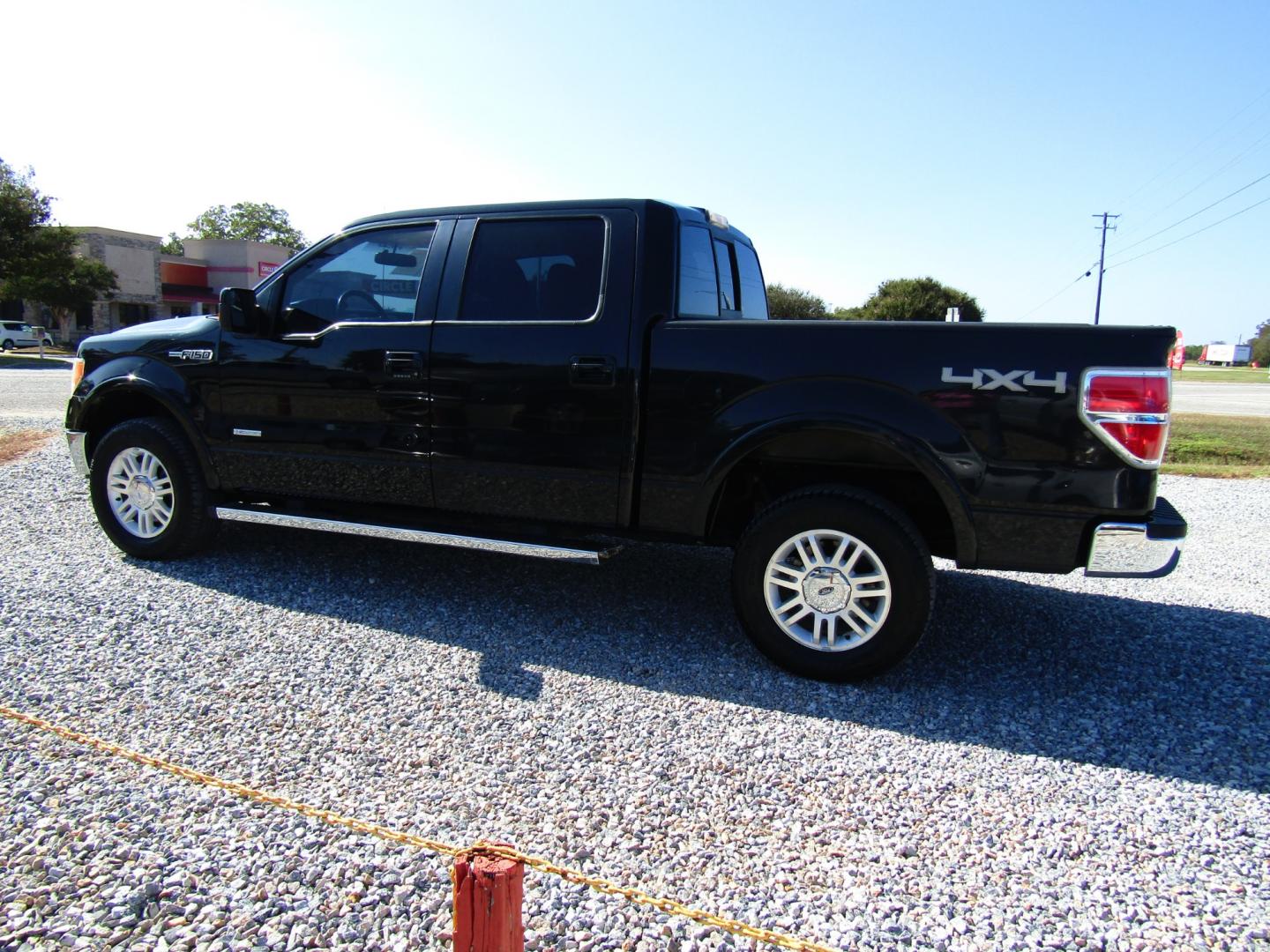 2011 Black /Tan Ford F-150 FX4 SuperCrew 5.5-ft. Bed 4WD (1FTFW1ETXBF) with an 3.5L V6 engine, Automatic transmission, located at 15016 S Hwy 231, Midland City, AL, 36350, (334) 983-3001, 31.306210, -85.495277 - Photo#5