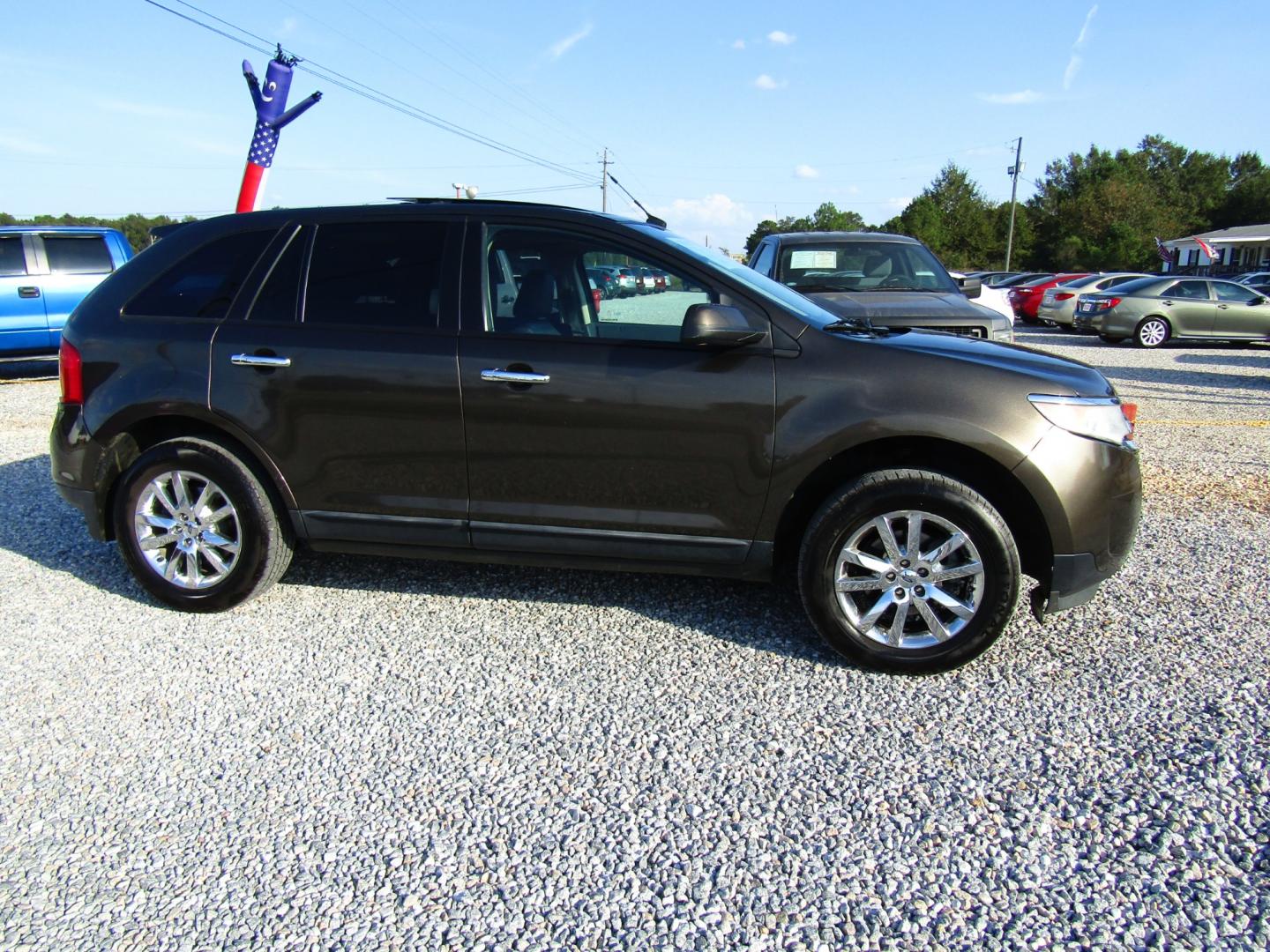 2011 Brown /Tan Ford Edge SEL FWD (2FMDK3JC5BB) with an 3.5L V6 DOHC 24V engine, Automatic transmission, located at 15016 S Hwy 231, Midland City, AL, 36350, (334) 983-3001, 31.306210, -85.495277 - Photo#0