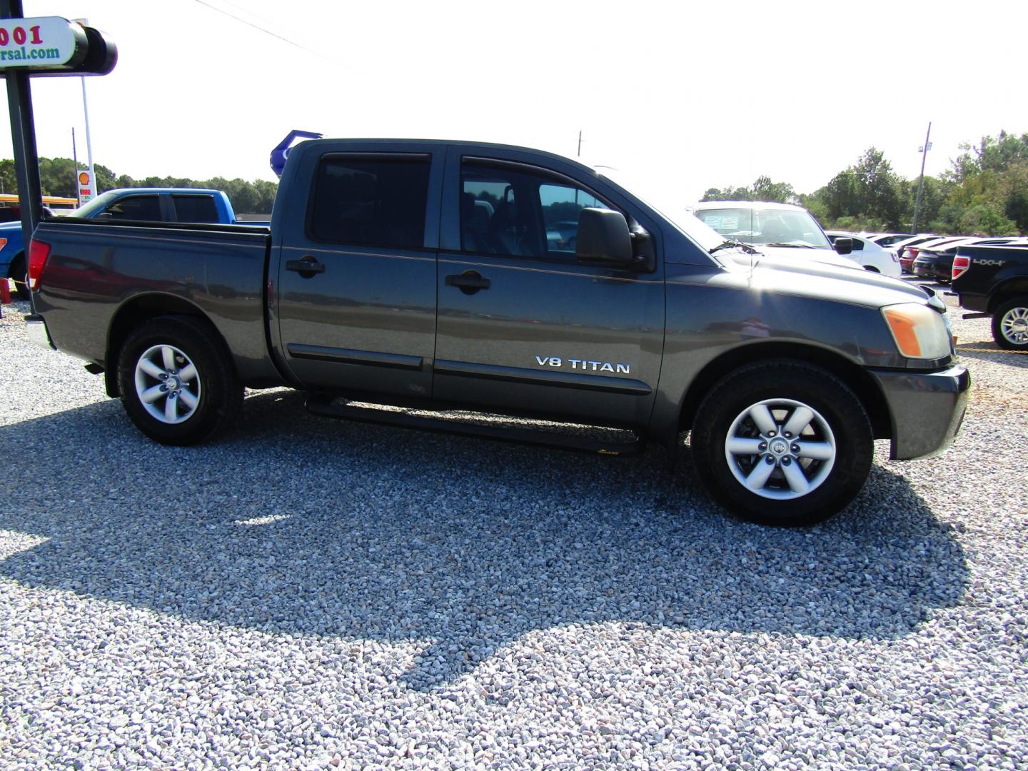 2010 Gray Nissan Titan LE Crew Cab 2WD SWB (1N6AA0ED4AN) with an 5.6L V8 DOHC 32V engine, Automatic transmission, located at 15016 S Hwy 231, Midland City, AL, 36350, (334) 983-3001, 31.306210, -85.495277 - Photo#0