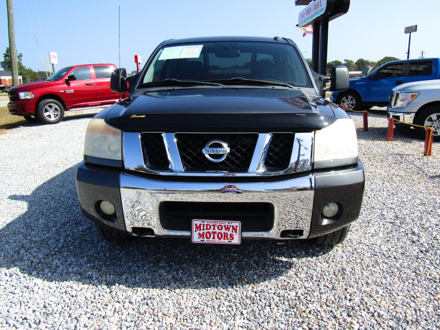 2010 Gray Nissan Titan LE Crew Cab 2WD SWB (1N6AA0ED4AN) with an 5.6L V8 DOHC 32V engine, Automatic transmission, located at 15016 S Hwy 231, Midland City, AL, 36350, (334) 983-3001, 31.306210, -85.495277 - Photo#1