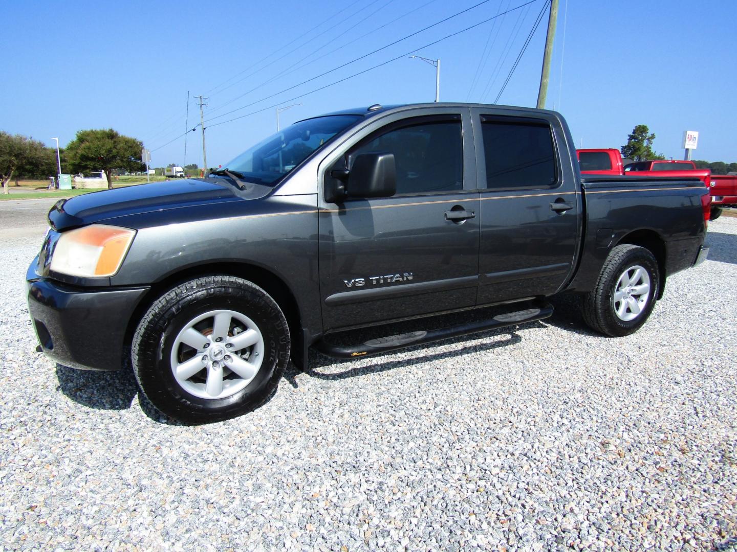 2010 Gray Nissan Titan LE Crew Cab 2WD SWB (1N6AA0ED4AN) with an 5.6L V8 DOHC 32V engine, Automatic transmission, located at 15016 S Hwy 231, Midland City, AL, 36350, (334) 983-3001, 31.306210, -85.495277 - Photo#2