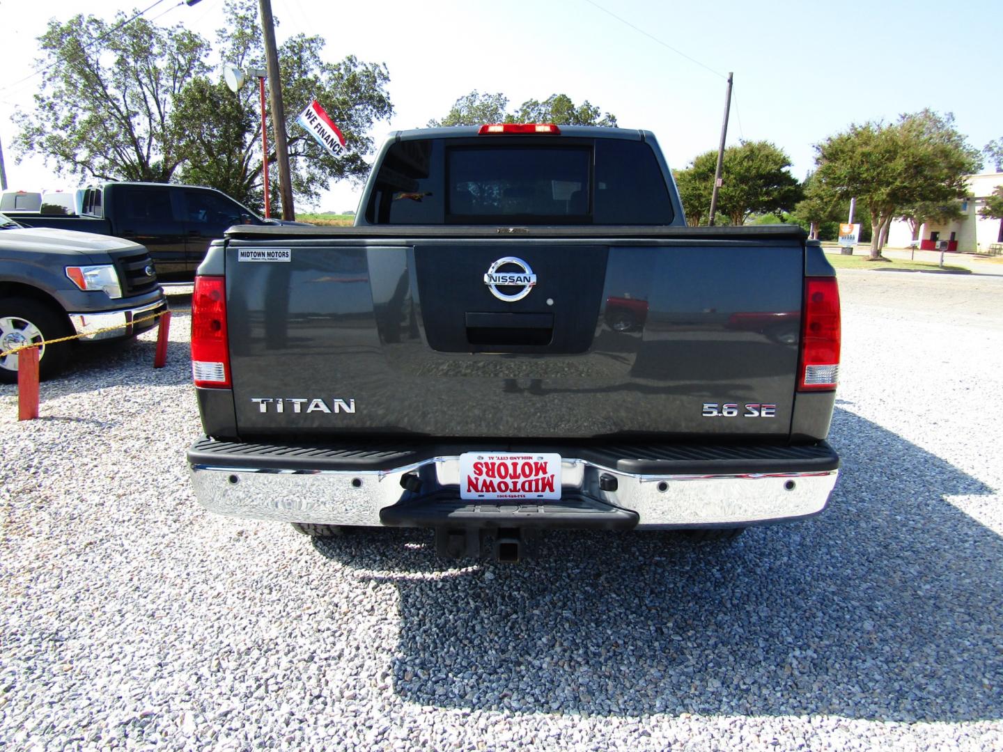 2010 Gray Nissan Titan LE Crew Cab 2WD SWB (1N6AA0ED4AN) with an 5.6L V8 DOHC 32V engine, Automatic transmission, located at 15016 S Hwy 231, Midland City, AL, 36350, (334) 983-3001, 31.306210, -85.495277 - Photo#6