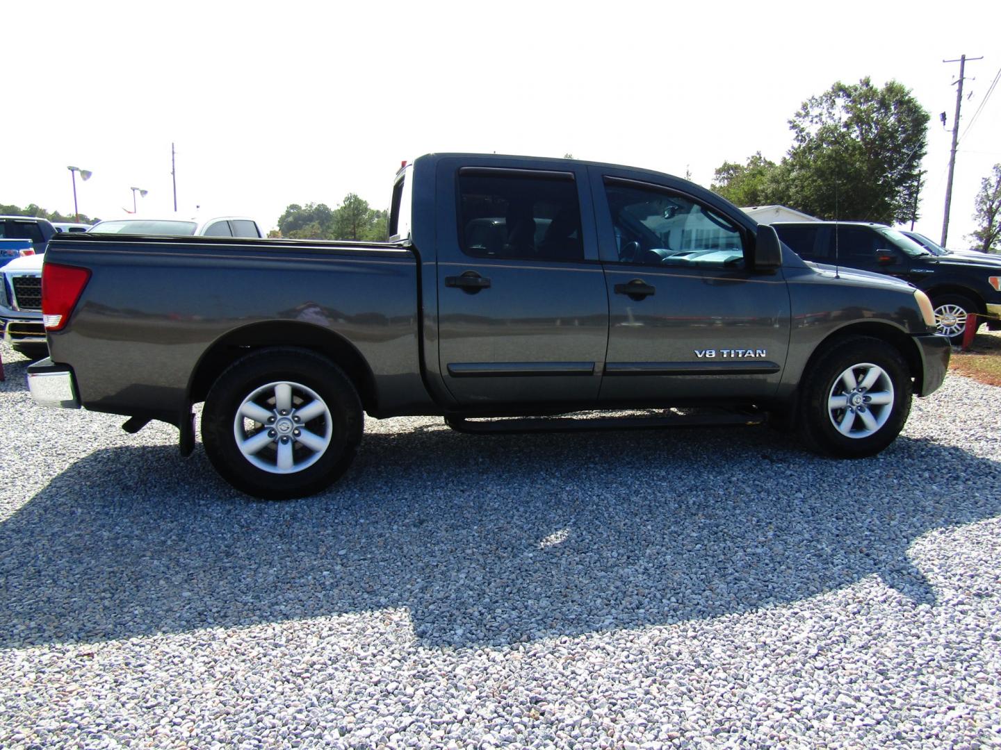 2010 Gray Nissan Titan LE Crew Cab 2WD SWB (1N6AA0ED4AN) with an 5.6L V8 DOHC 32V engine, Automatic transmission, located at 15016 S Hwy 231, Midland City, AL, 36350, (334) 983-3001, 31.306210, -85.495277 - Photo#7