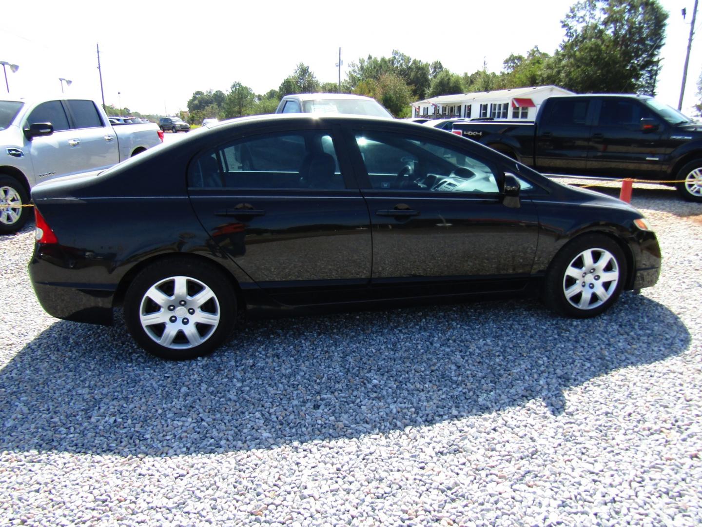 2009 Black /Gray Honda Civic LX Sedan 5-Speed AT (19XFA16589E) with an 1.8L L4 SOHC 16V engine, Automatic transmission, located at 15016 S Hwy 231, Midland City, AL, 36350, (334) 983-3001, 31.306210, -85.495277 - Photo#7