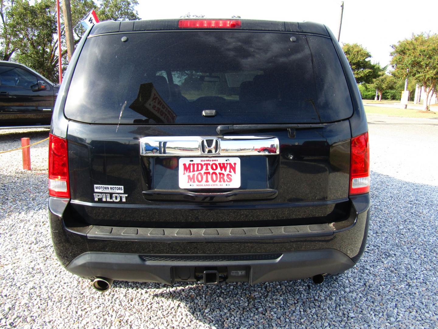 2013 Black /Gray Honda Pilot EX-L 2WD 5-Spd AT with Navigation (5FNYF3H73DB) with an 3.5L V6 SOHC 24V engine, Automatic transmission, located at 15016 S Hwy 231, Midland City, AL, 36350, (334) 983-3001, 31.306210, -85.495277 - Photo#6