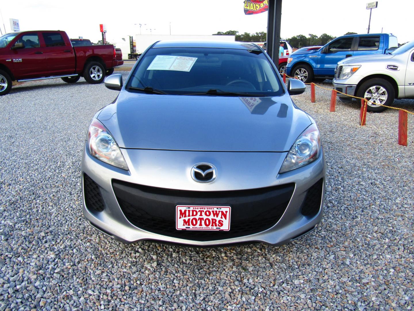 2013 Gray /Gray Mazda MAZDA3 i Sport 4-Door (JM1BL1U7XD1) with an 2.0L L4 DOHC 16V engine, Automatic transmission, located at 15016 S Hwy 231, Midland City, AL, 36350, (334) 983-3001, 31.306210, -85.495277 - Photo#1