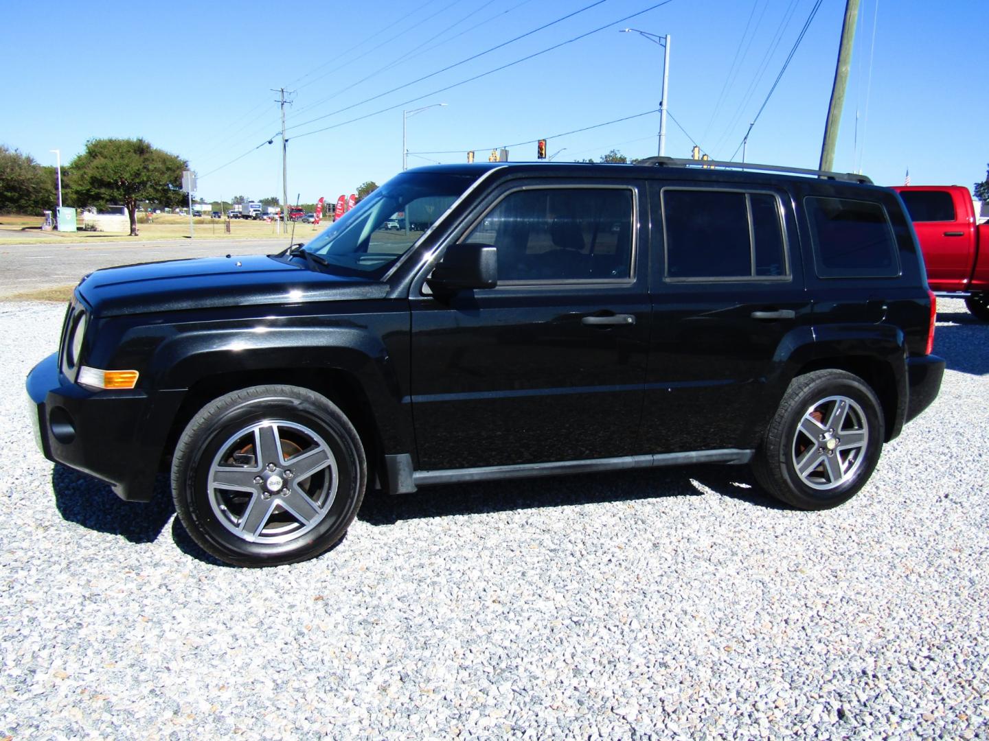 2008 Black /Black Jeep Patriot Sport 2WD (1J8FT28058D) with an 2.0L L4 DOHC 16V engine, Automatic transmission, located at 15016 S Hwy 231, Midland City, AL, 36350, (334) 983-3001, 31.306210, -85.495277 - Photo#2