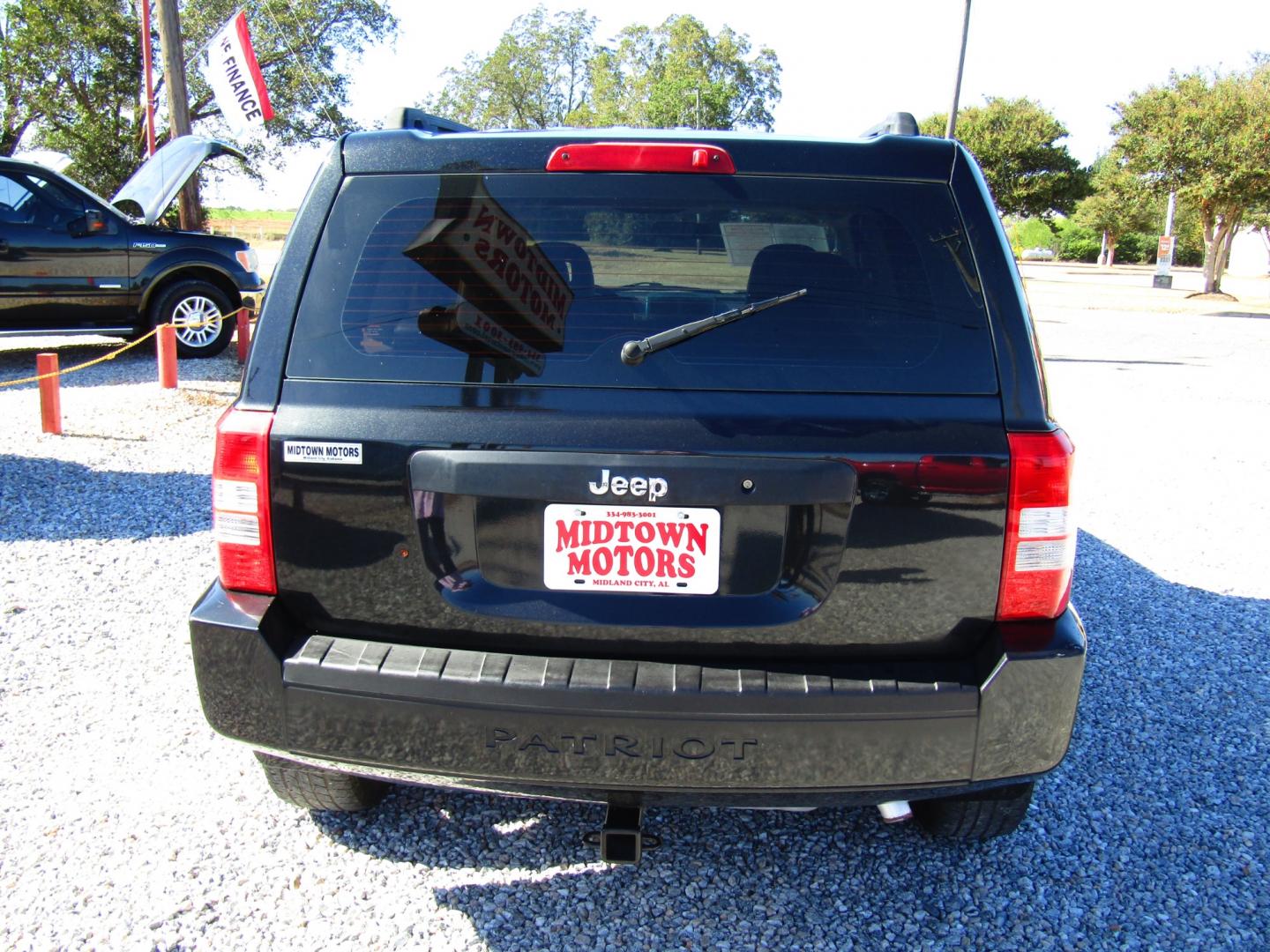 2008 Black /Black Jeep Patriot Sport 2WD (1J8FT28058D) with an 2.0L L4 DOHC 16V engine, Automatic transmission, located at 15016 S Hwy 231, Midland City, AL, 36350, (334) 983-3001, 31.306210, -85.495277 - Photo#6