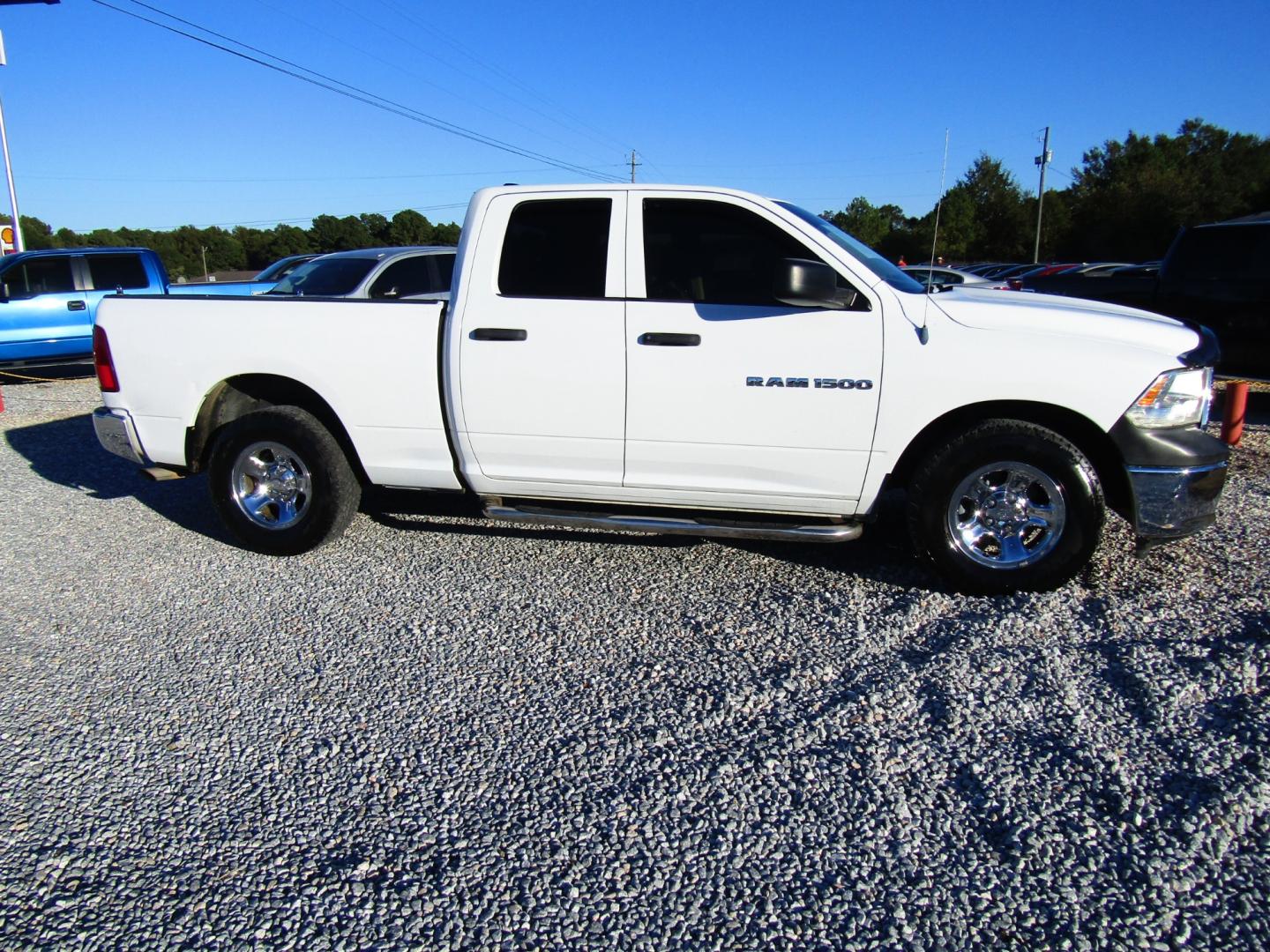 2011 WHITE /Gray Dodge Ram 1500 SLT Quad Cab 2WD (1D7RB1GK5BS) with an 3.7L V6 SOHC 12V engine, Automatic transmission, located at 15016 S Hwy 231, Midland City, AL, 36350, (334) 983-3001, 31.306210, -85.495277 - Photo#0