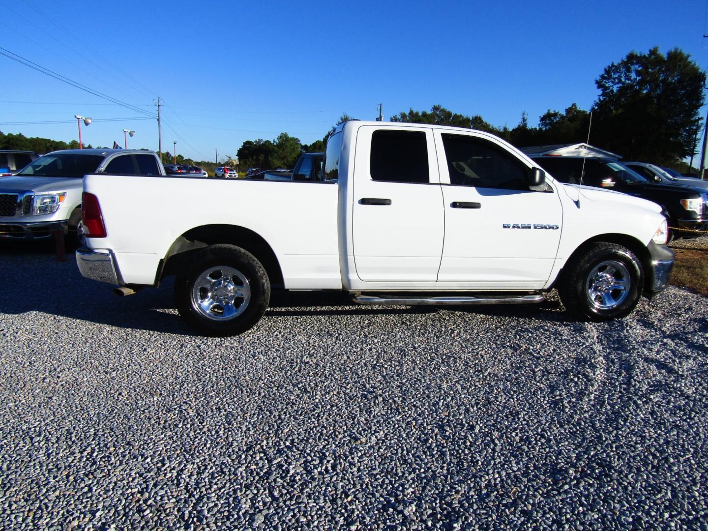 2011 WHITE /Gray Dodge Ram 1500 SLT Quad Cab 2WD (1D7RB1GK5BS) with an 3.7L V6 SOHC 12V engine, Automatic transmission, located at 15016 S Hwy 231, Midland City, AL, 36350, (334) 983-3001, 31.306210, -85.495277 - Photo#7