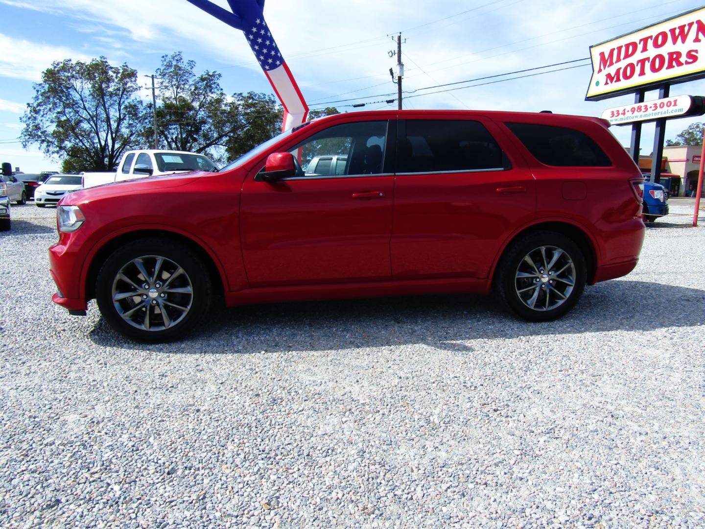 2014 Red /Black Dodge Durango SXT RWD (1C4RDHAG9EC) with an 3.6L V6 DOHC 24V engine, Automatic transmission, located at 15016 S Hwy 231, Midland City, AL, 36350, (334) 983-3001, 31.306210, -85.495277 - Photo#2