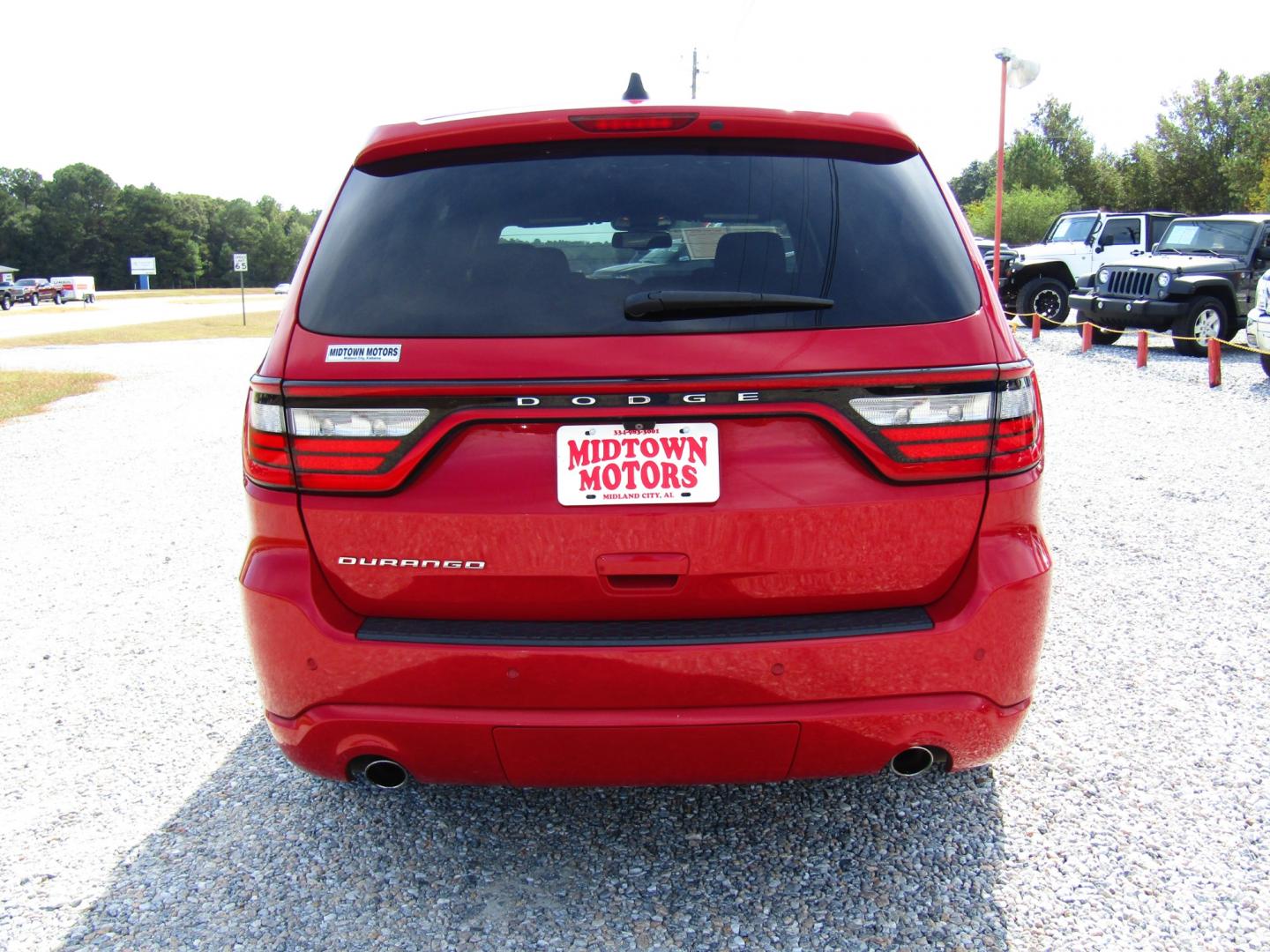 2014 Red /Black Dodge Durango SXT RWD (1C4RDHAG9EC) with an 3.6L V6 DOHC 24V engine, Automatic transmission, located at 15016 S Hwy 231, Midland City, AL, 36350, (334) 983-3001, 31.306210, -85.495277 - Photo#6