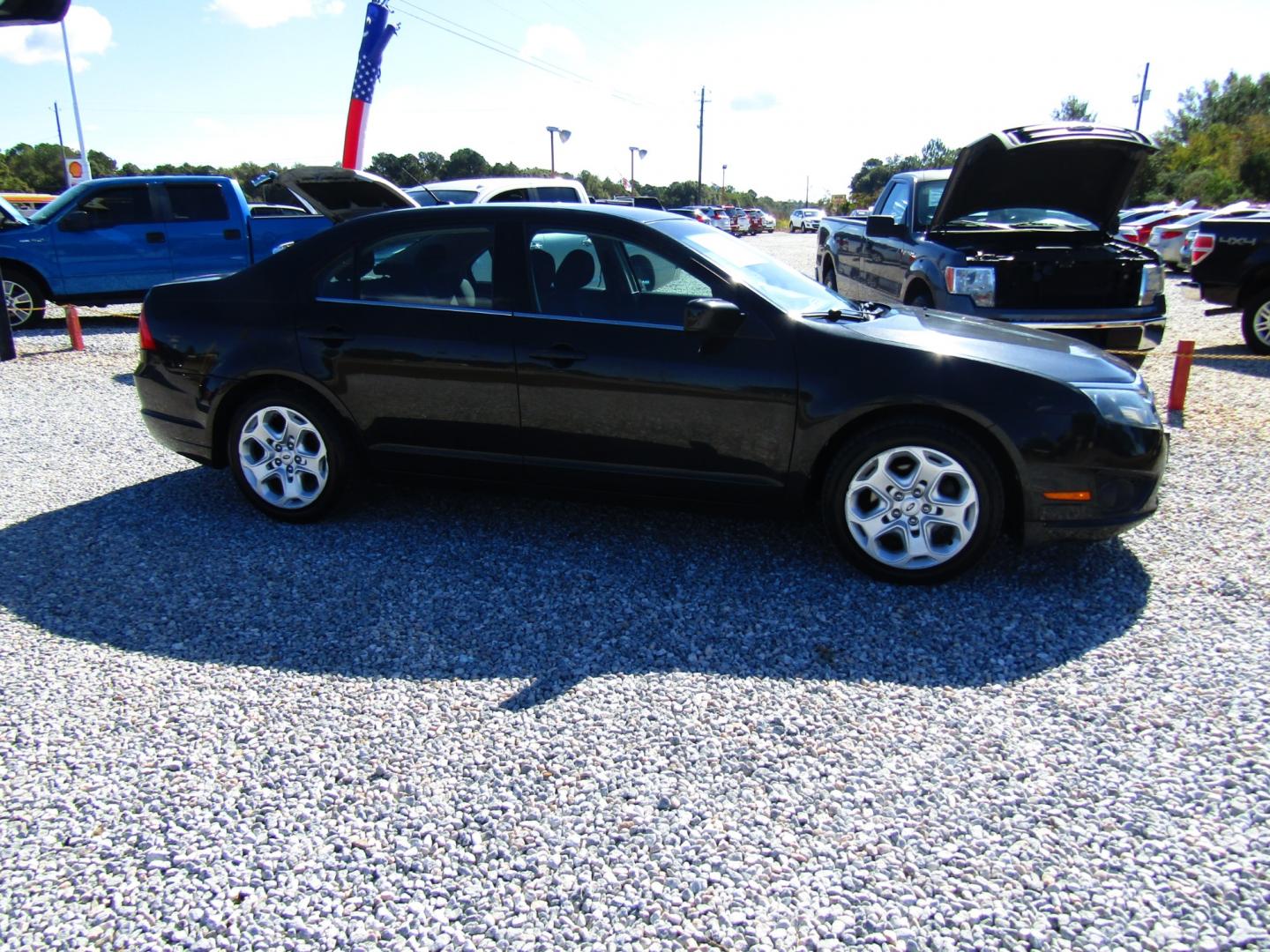 2011 Black /Black Ford Fusion I4 SE (3FAHP0HA2BR) with an 2.5L L4 DOHC 16V engine, Automatic transmission, located at 15016 S Hwy 231, Midland City, AL, 36350, (334) 983-3001, 31.306210, -85.495277 - Photo#0